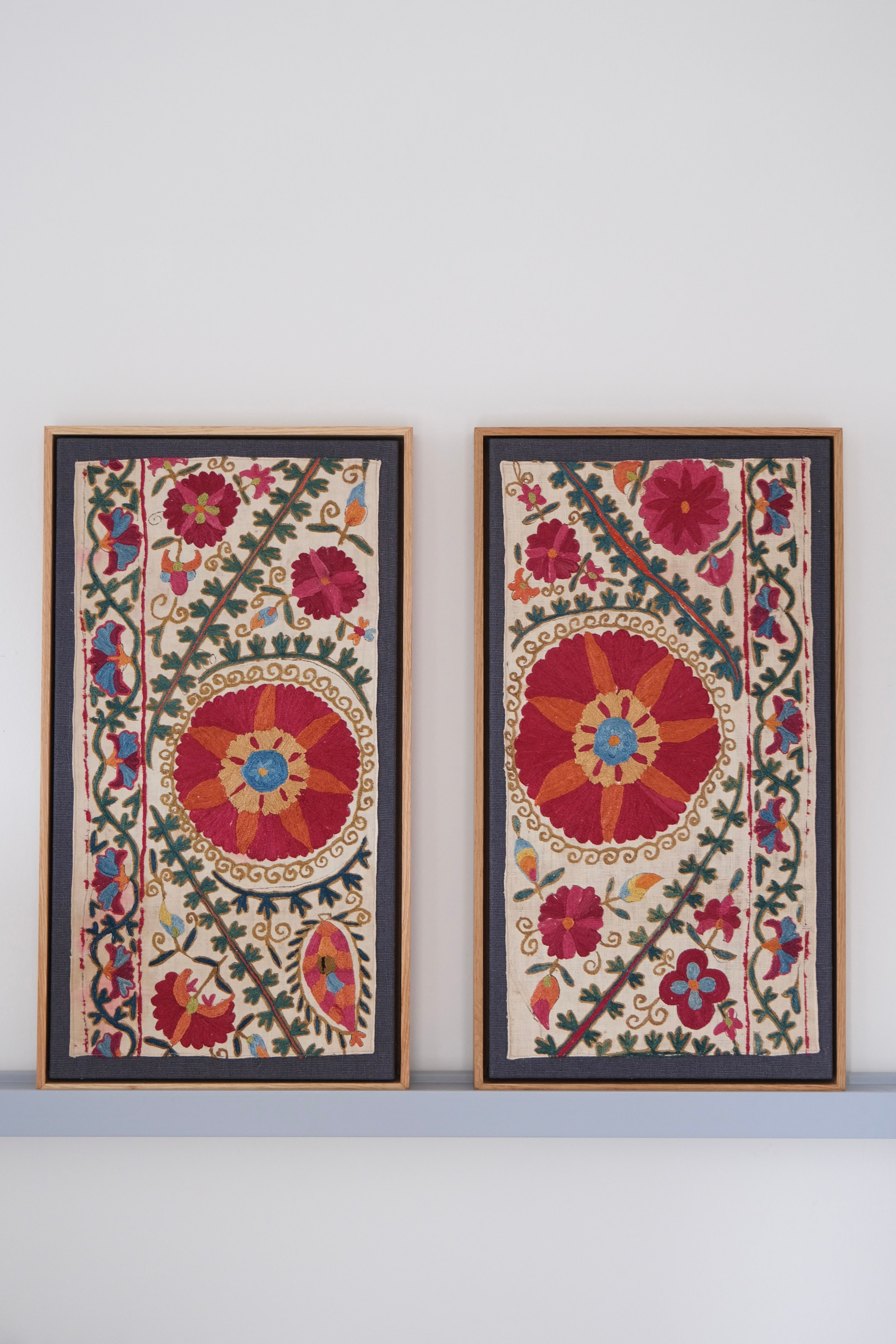 Pair of framed antique suzanis