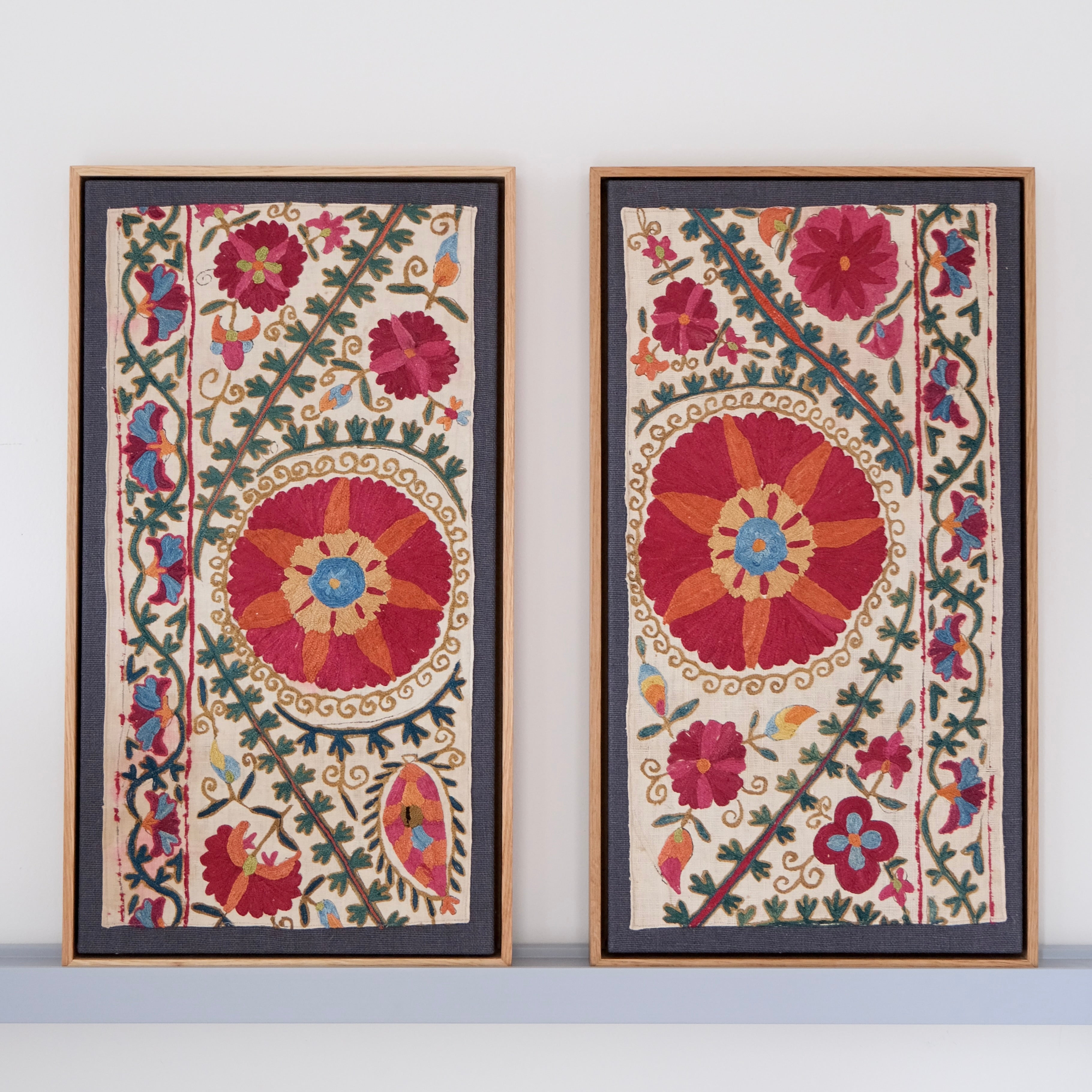Pair of framed antique suzanis