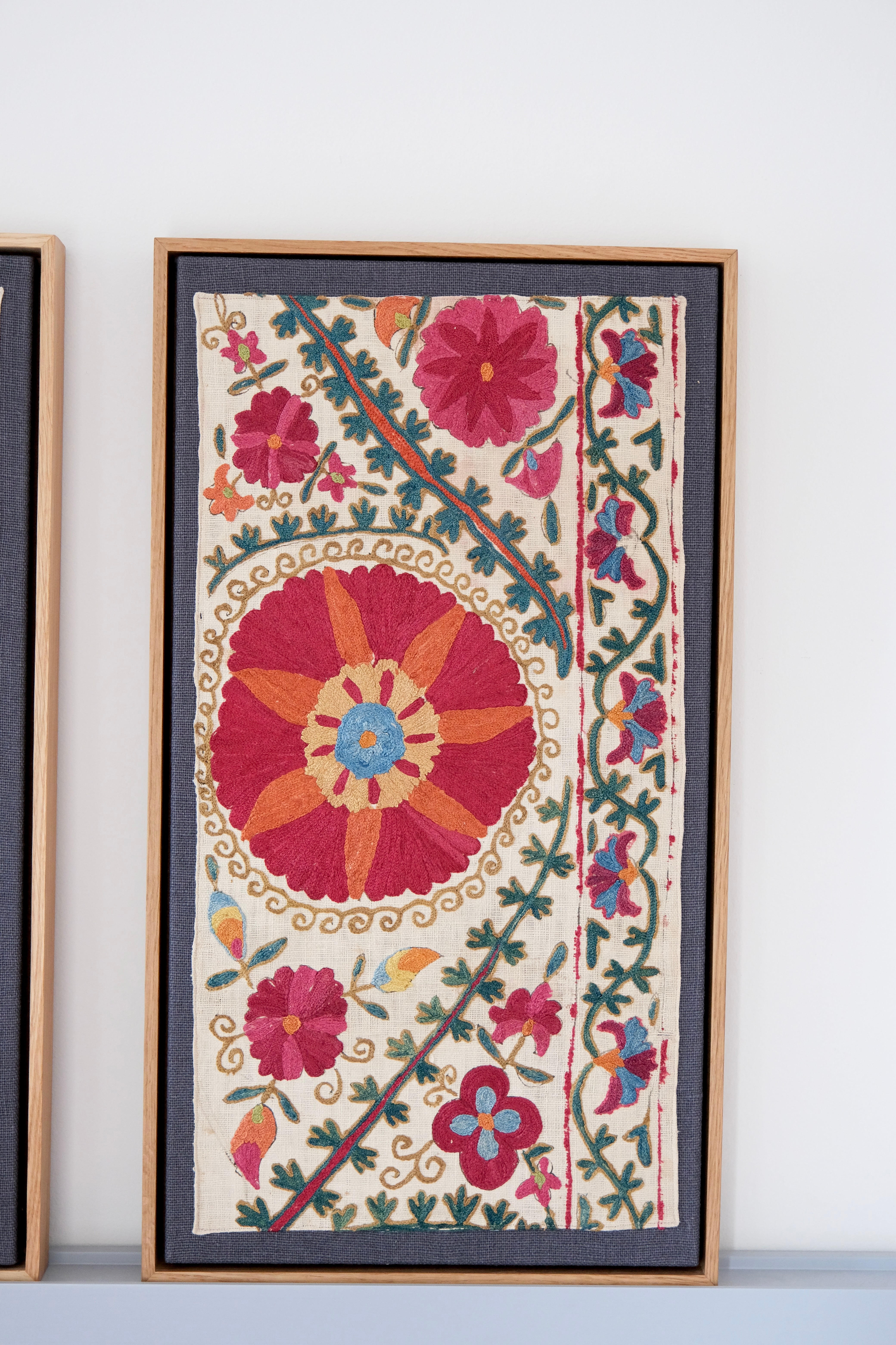 Pair of framed antique suzanis