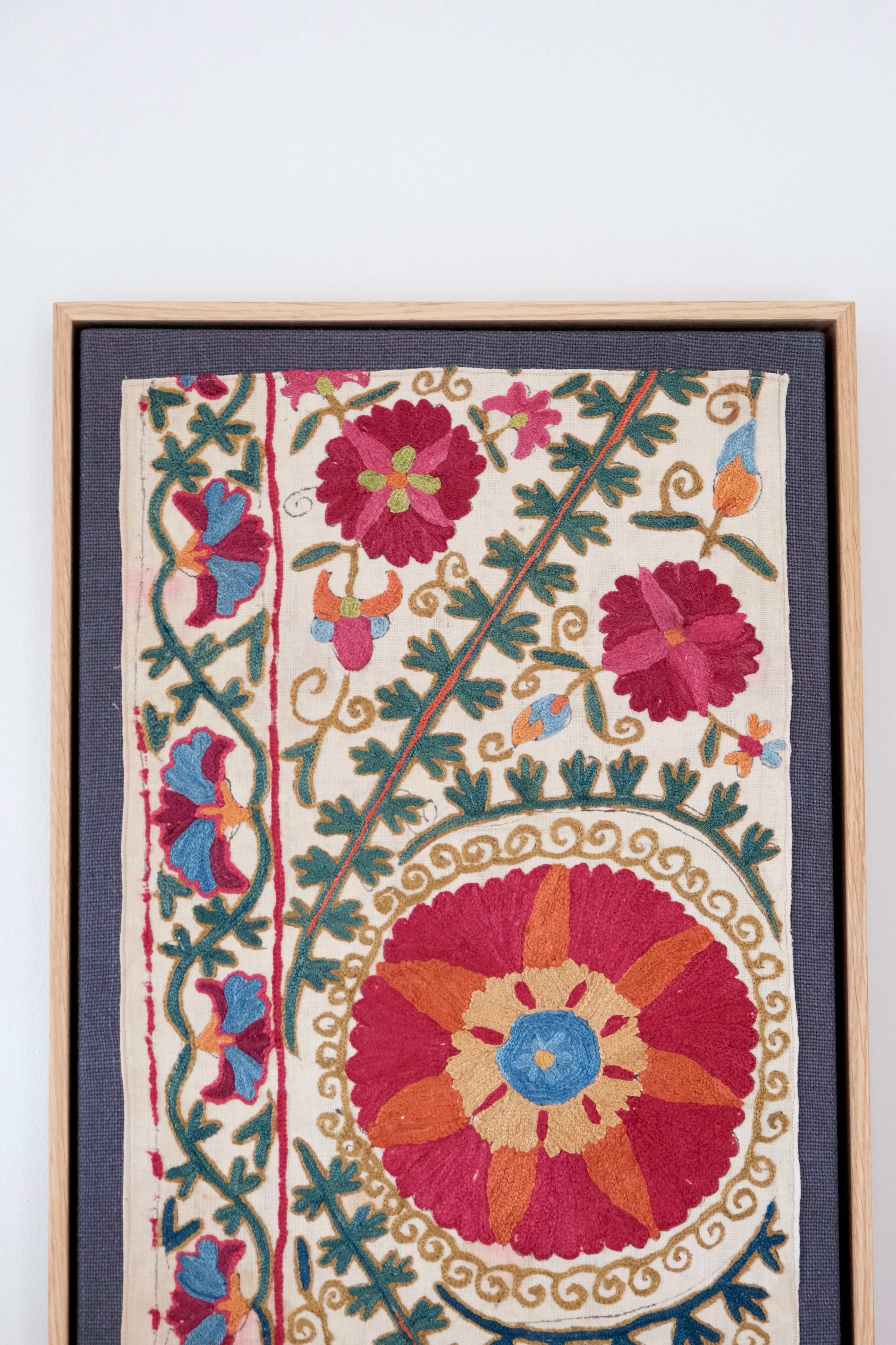 Pair of framed antique suzanis