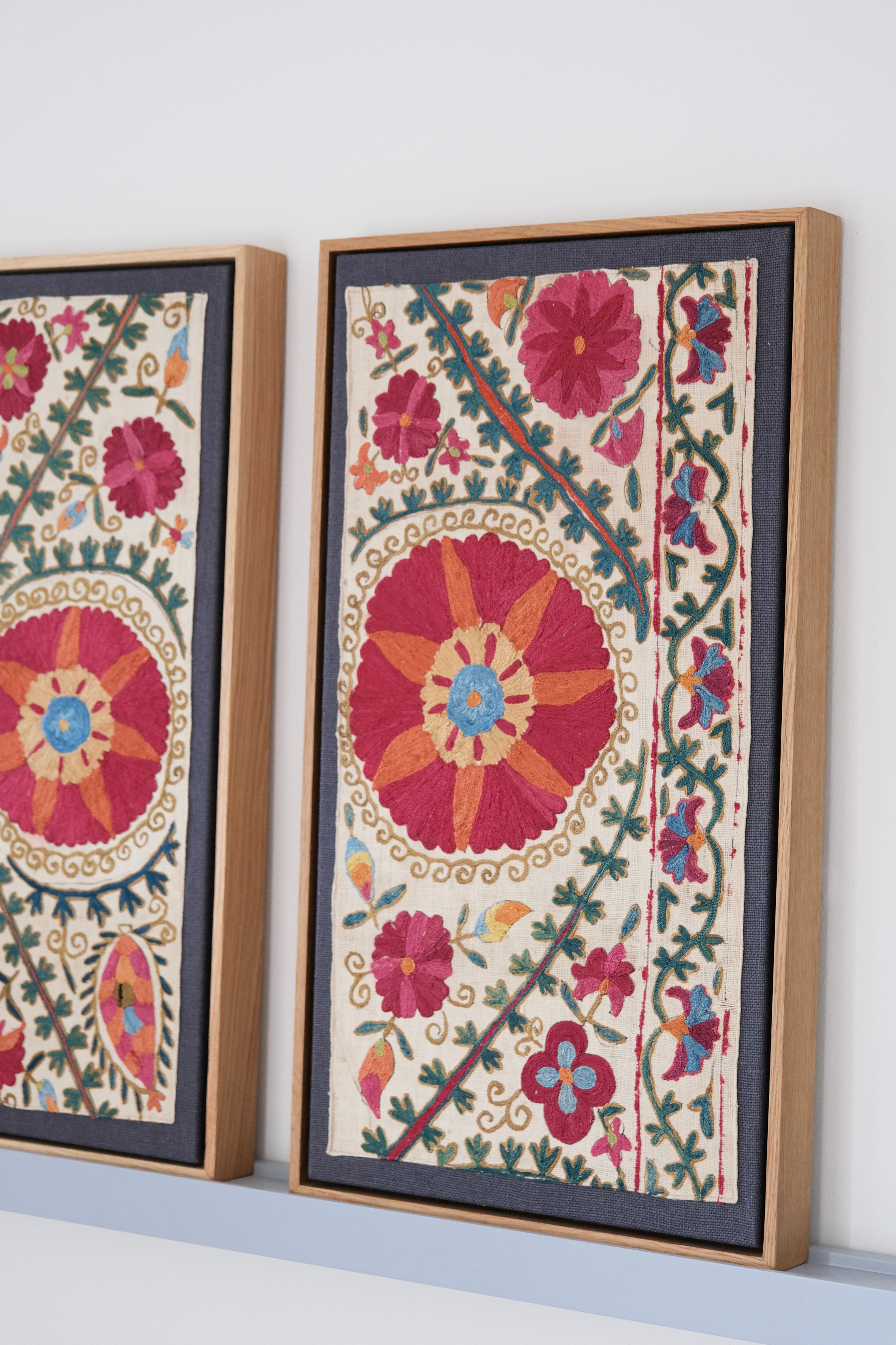 Pair of framed antique suzanis