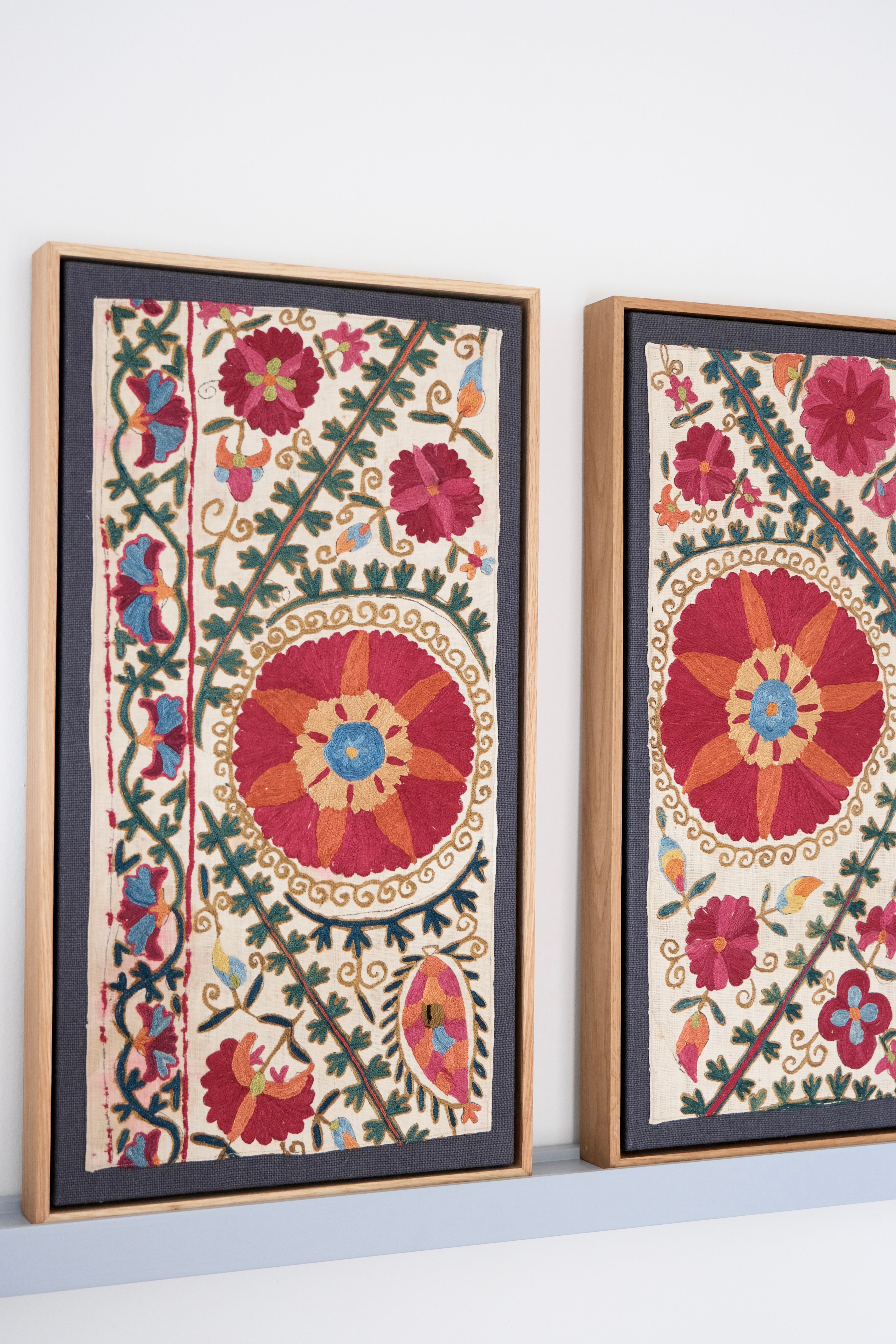 Pair of framed antique suzanis