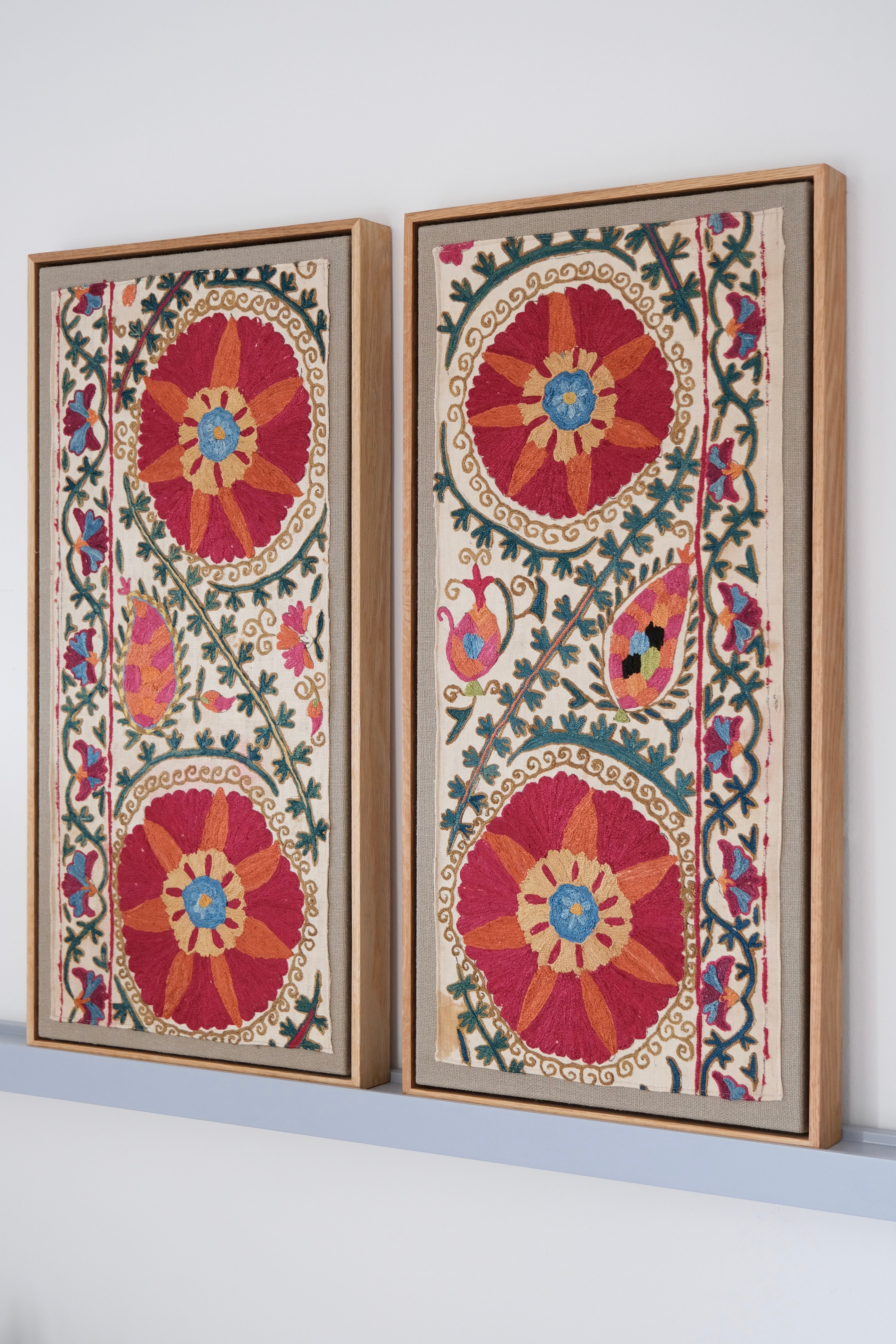 Pair of framed antique suzanis