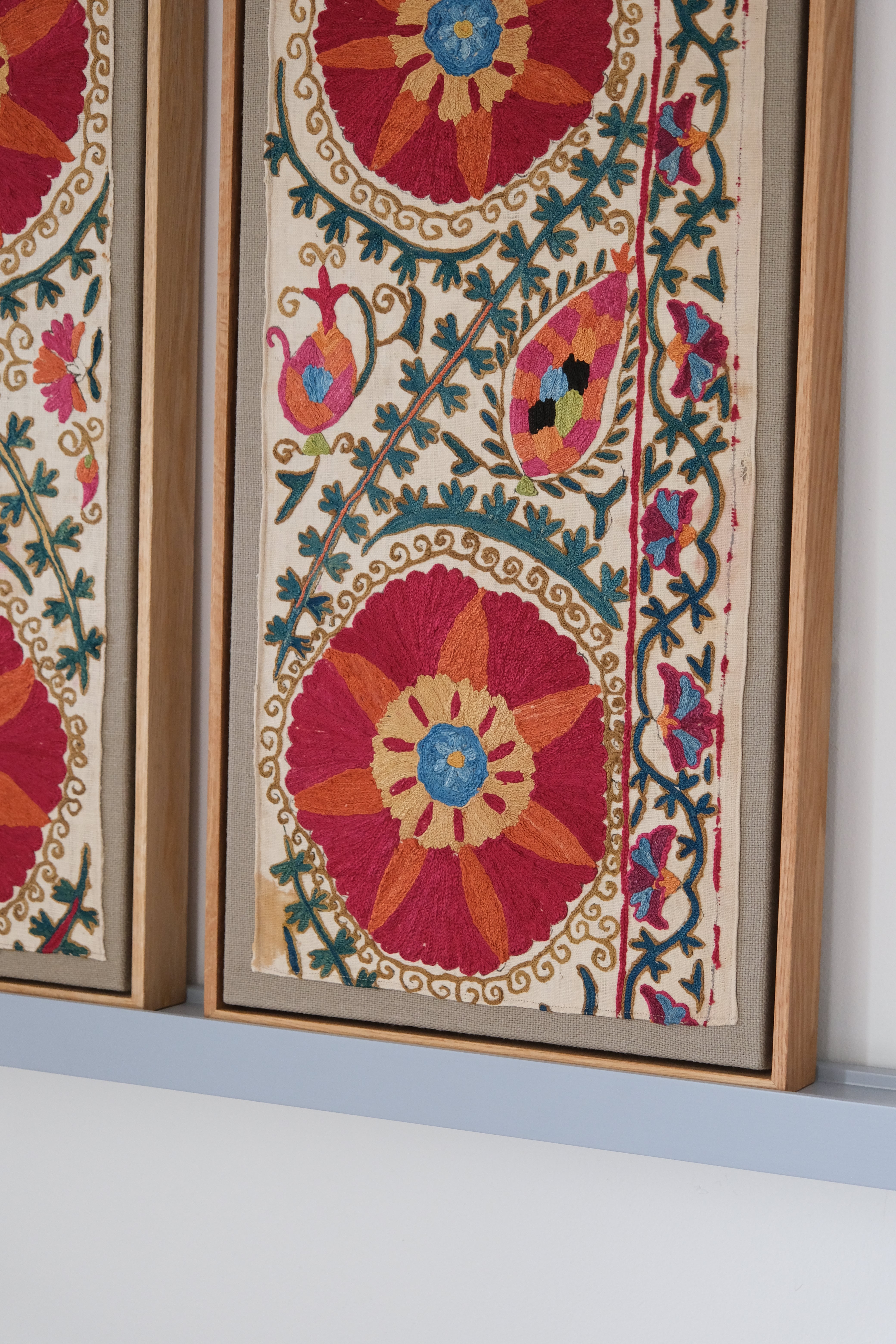 Pair of framed antique suzanis