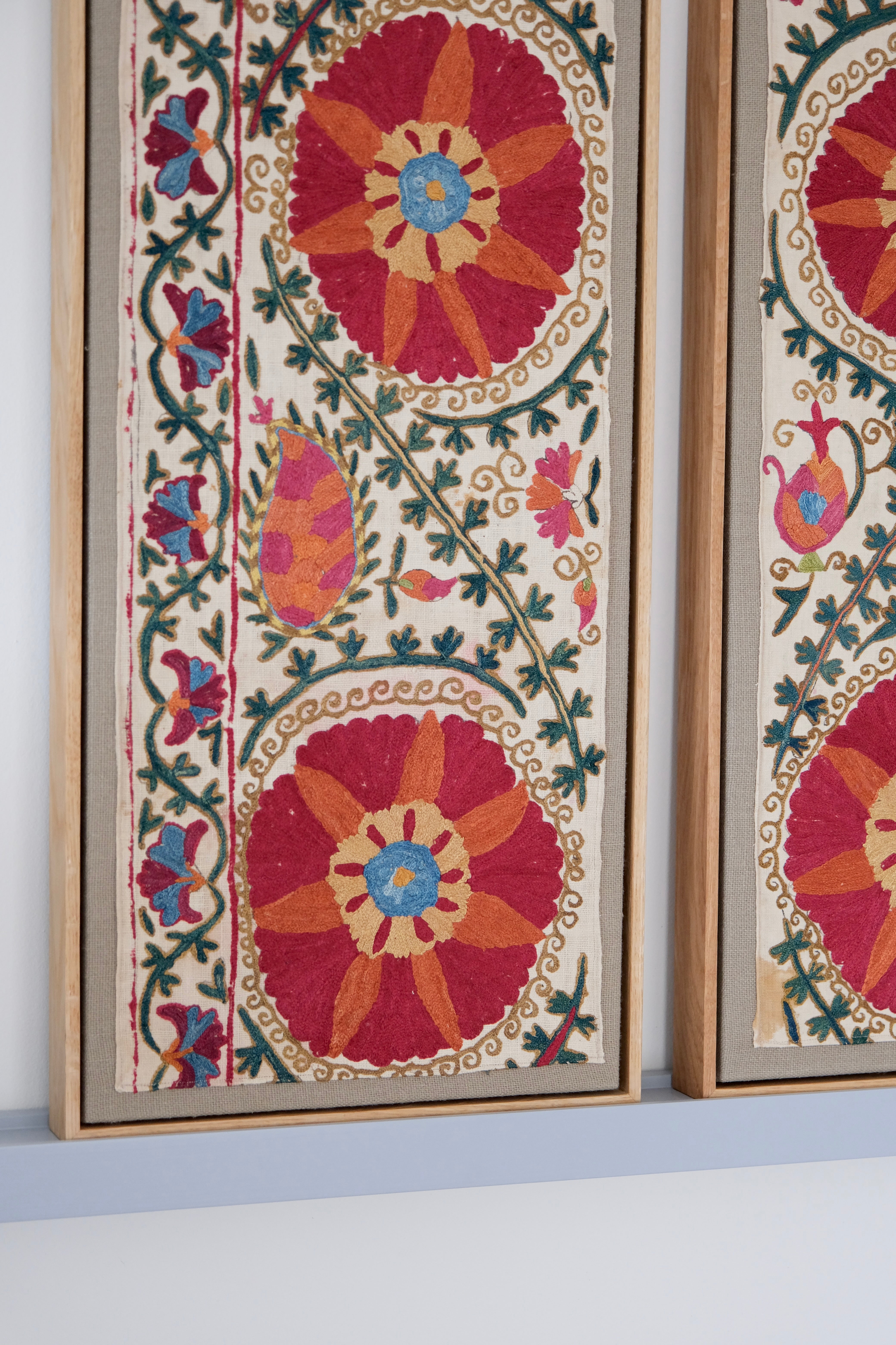 Pair of framed antique suzanis