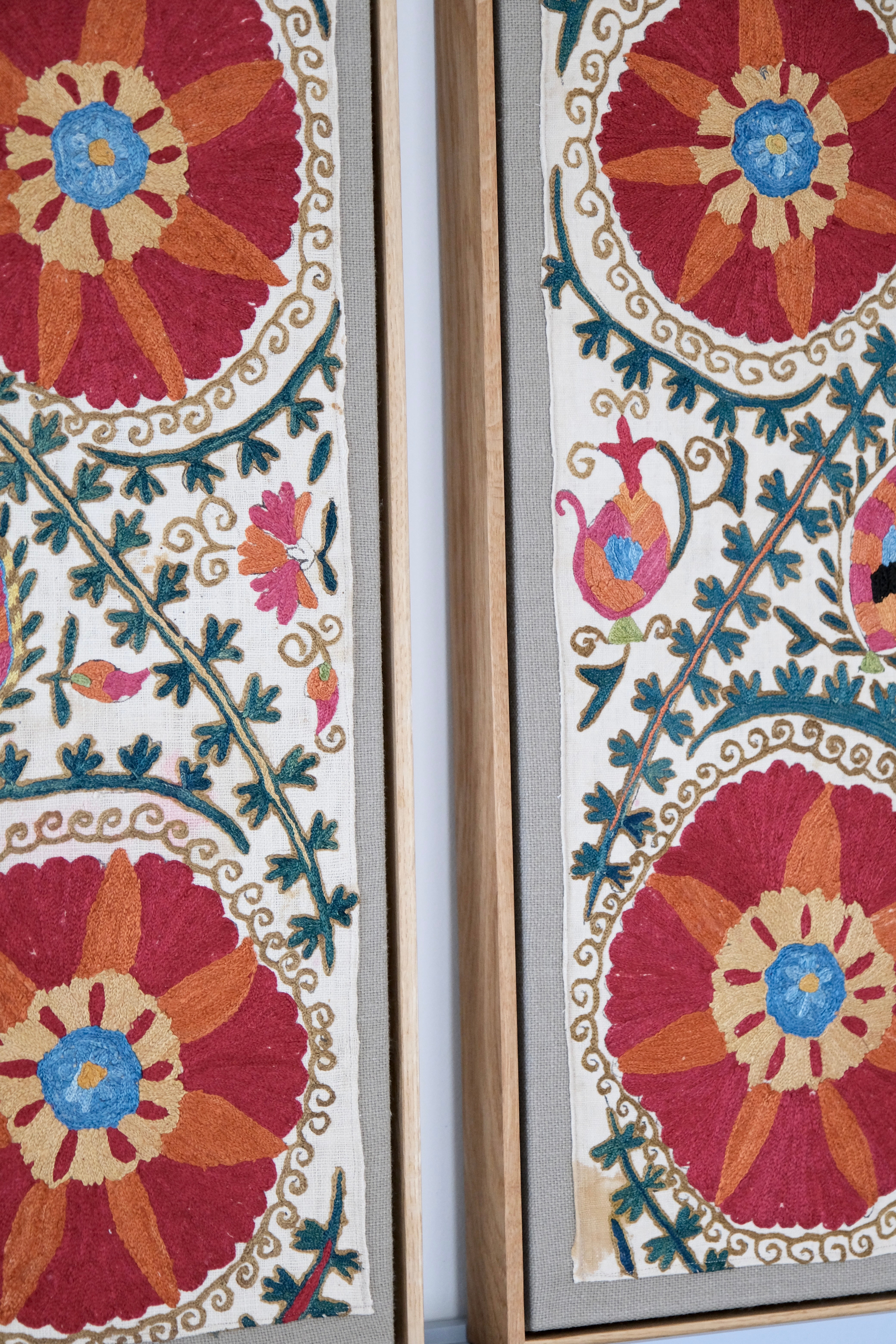 Pair of framed antique suzanis