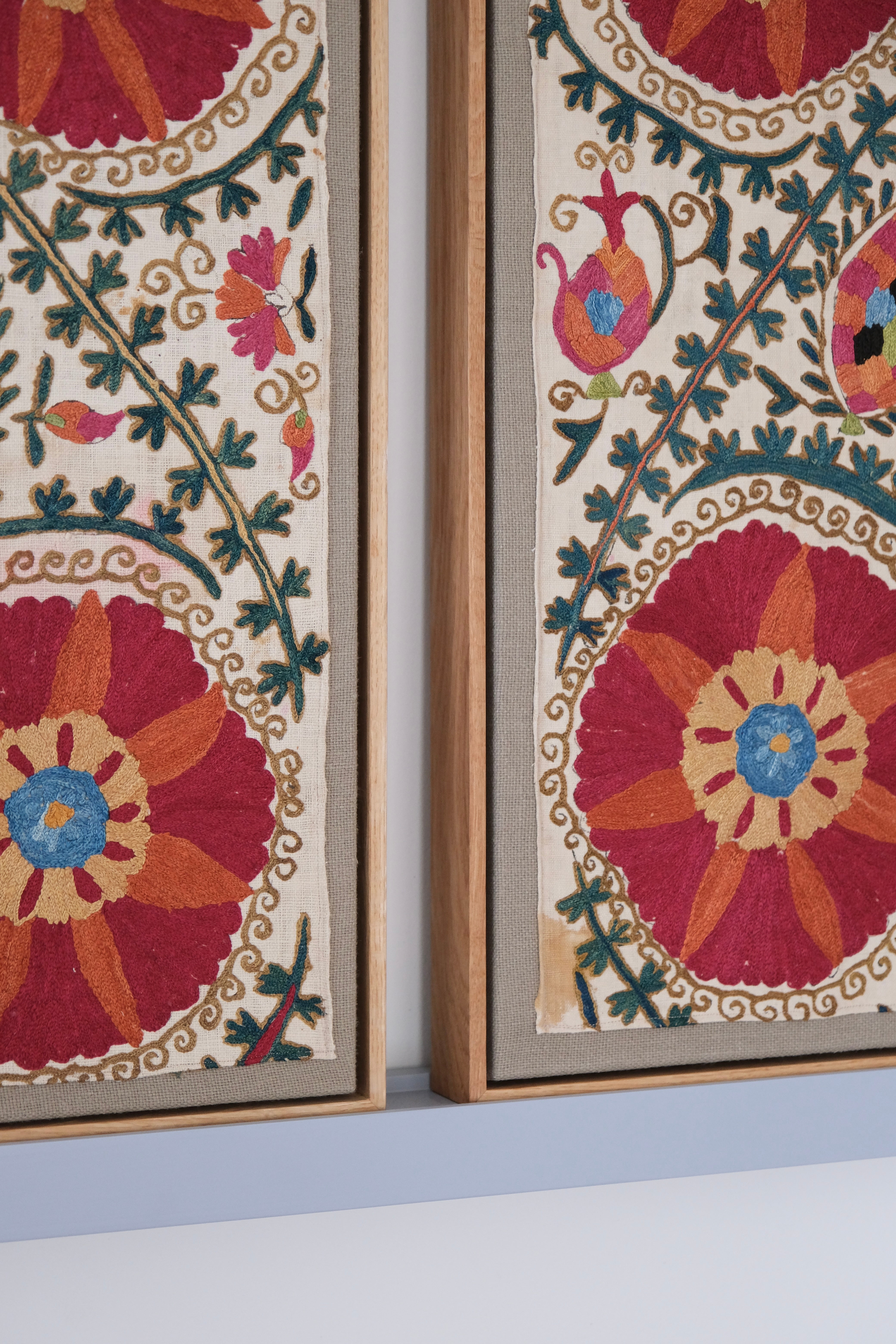 Pair of framed antique suzanis