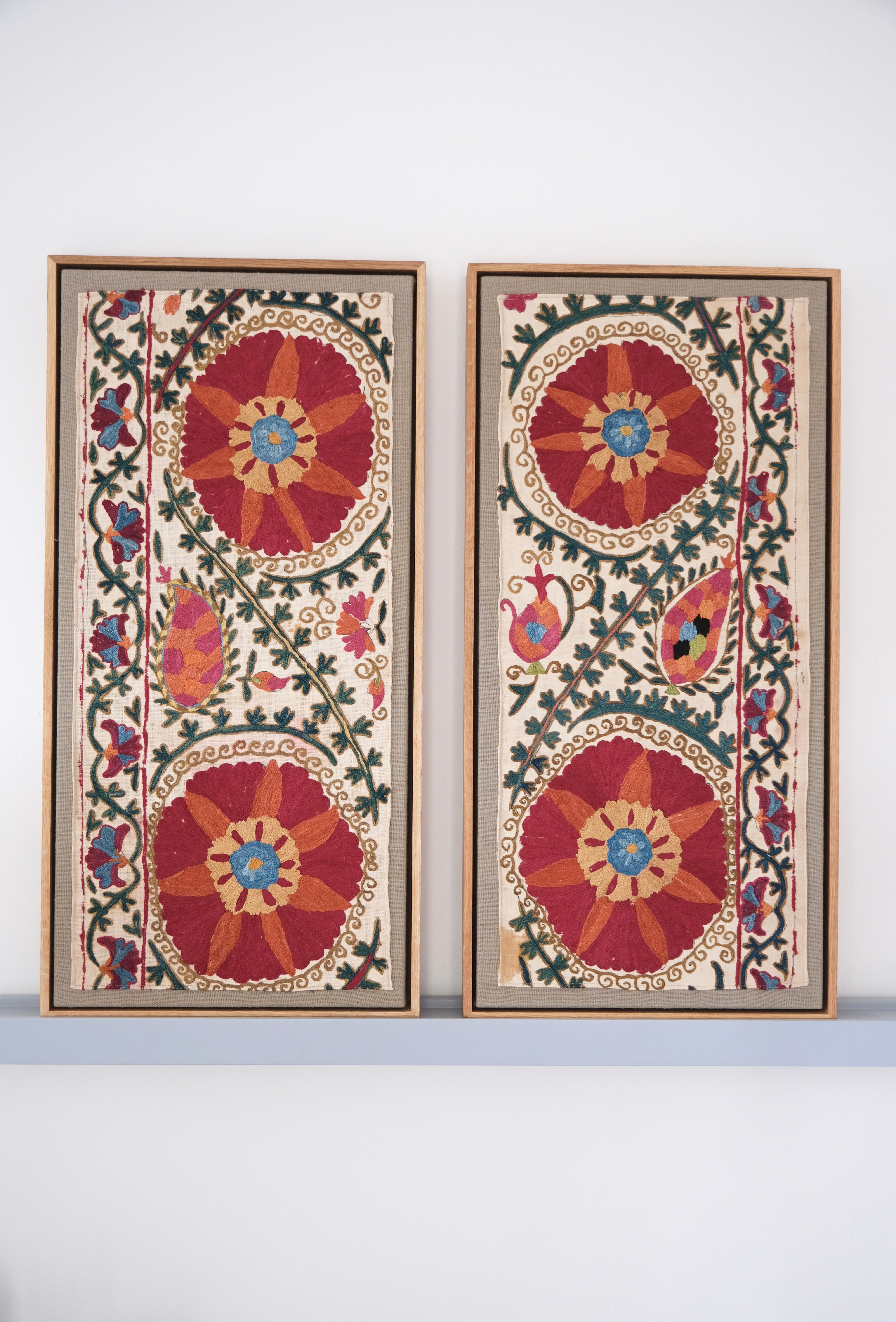 Pair of framed antique suzanis