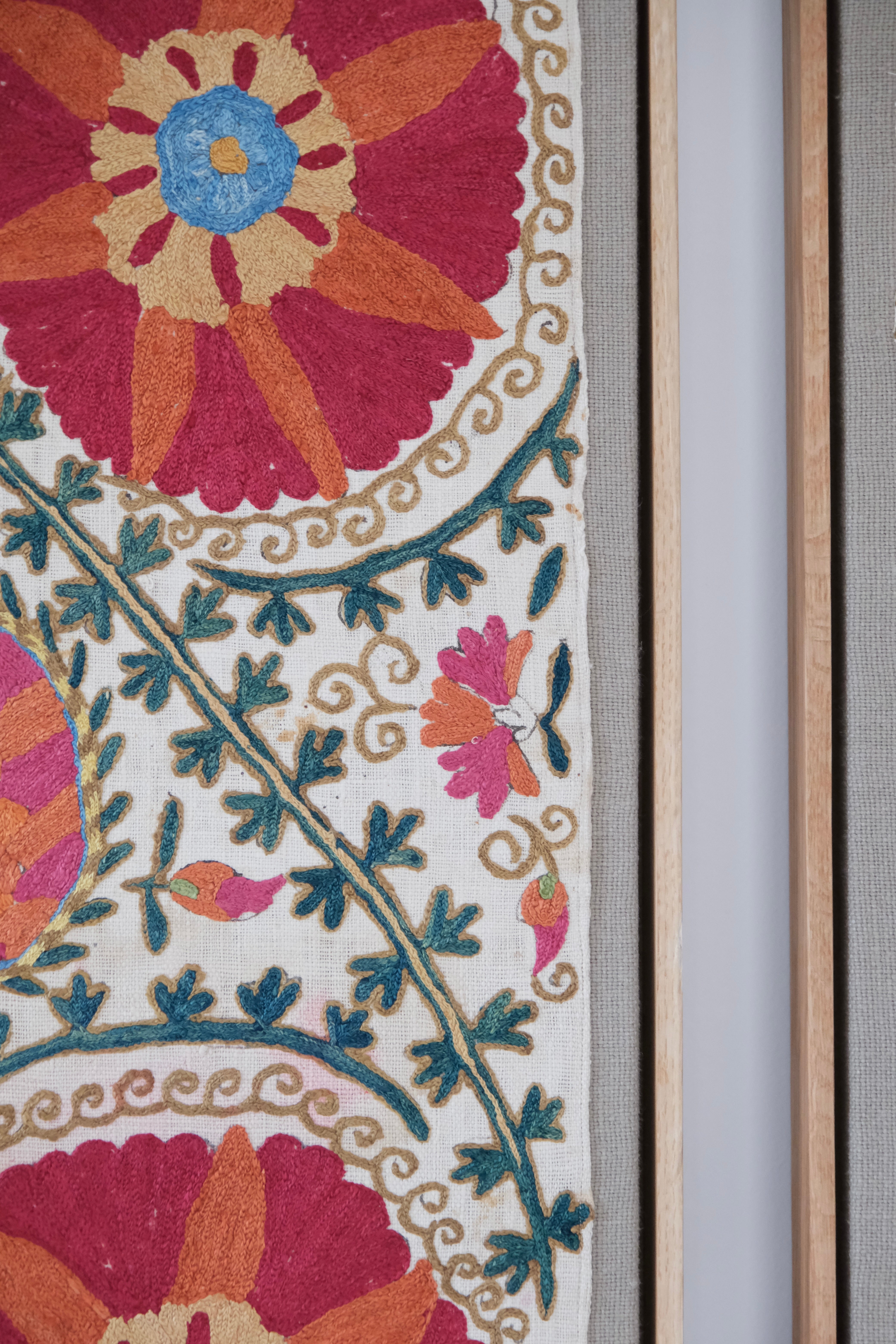 Pair of framed antique suzanis