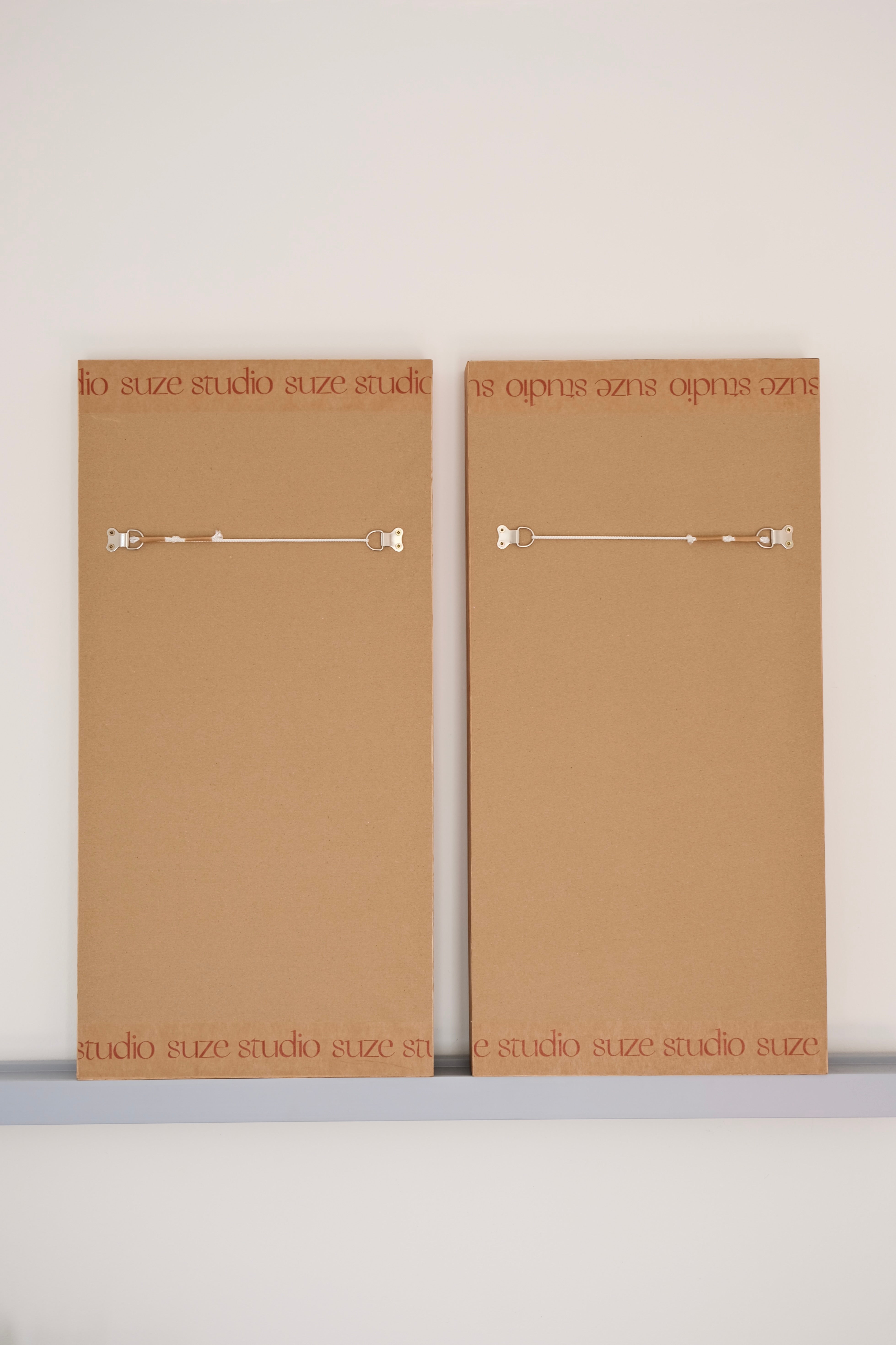 Pair of framed antique suzanis