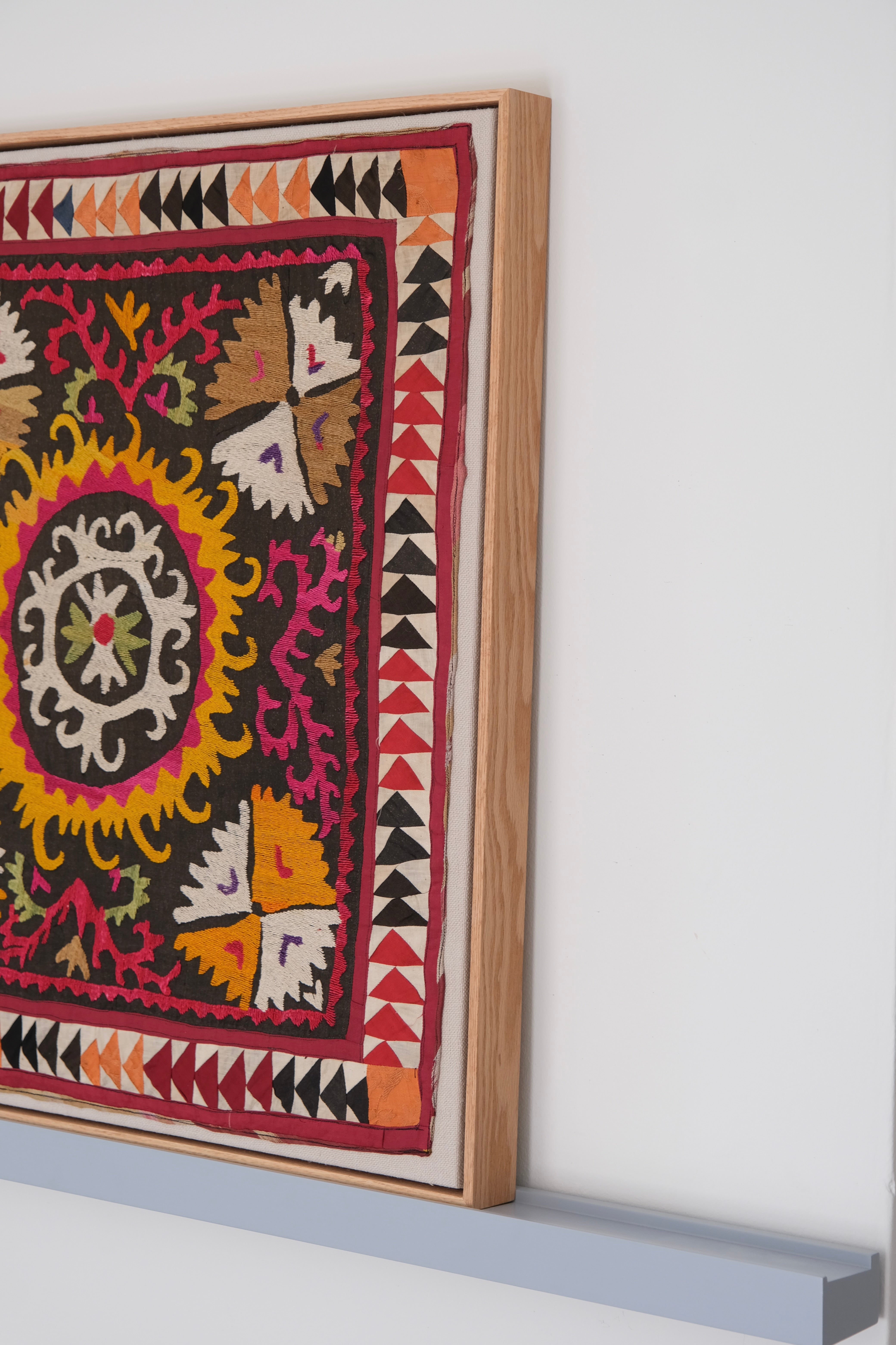 Framed vintage suzani, multicolour