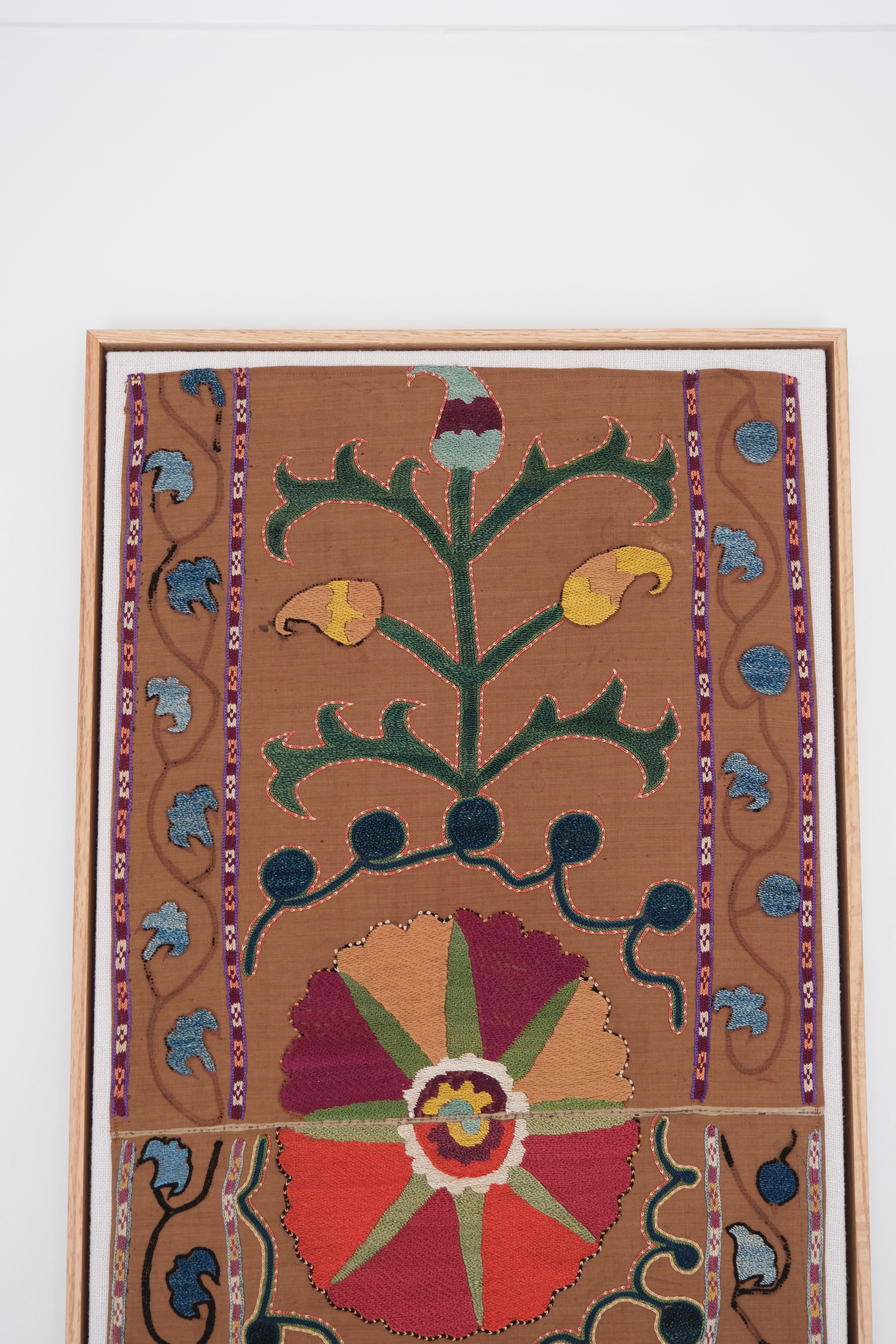 Framed antique suzani, camel & ivory