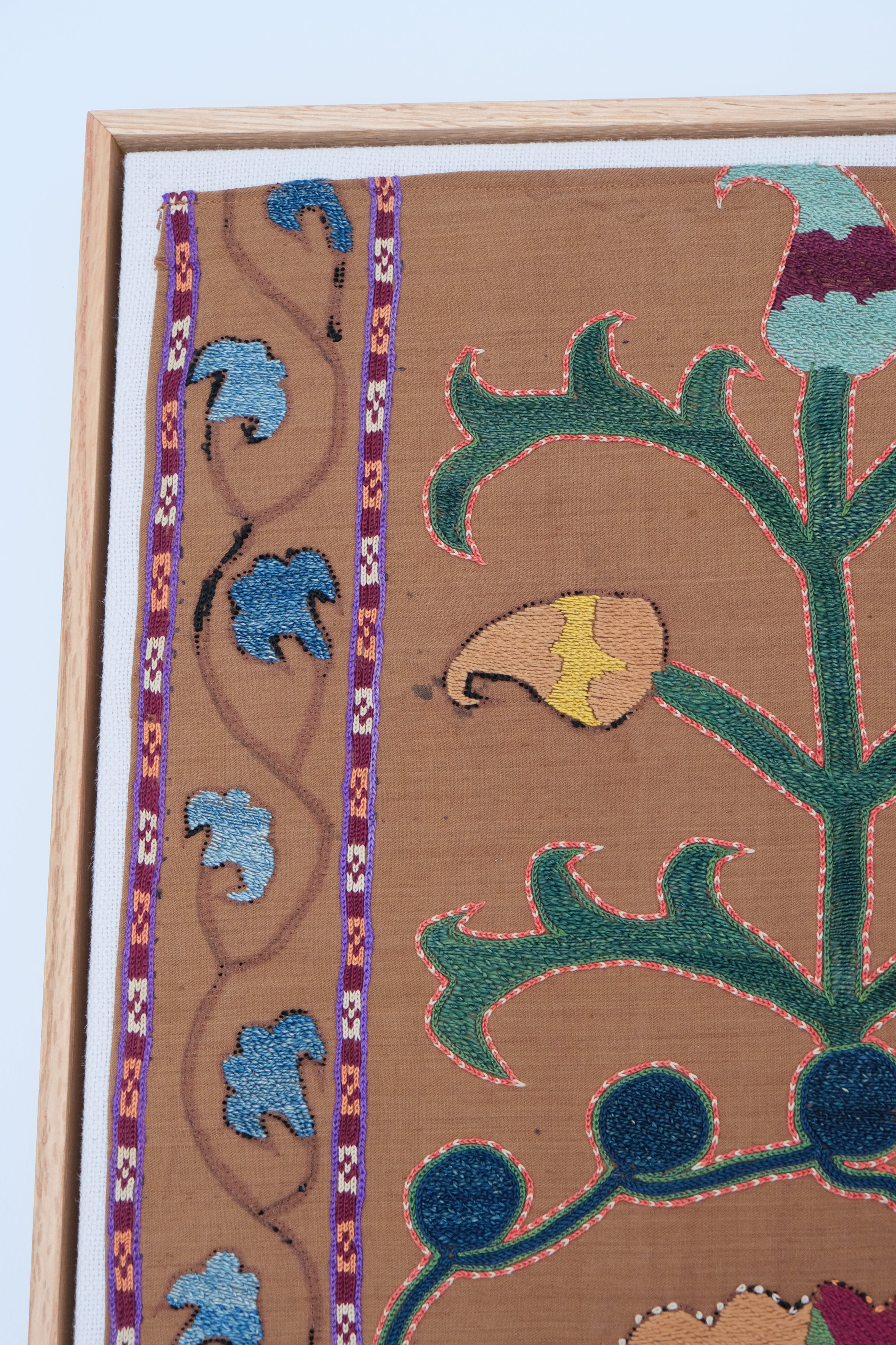 Framed antique suzani, camel & ivory