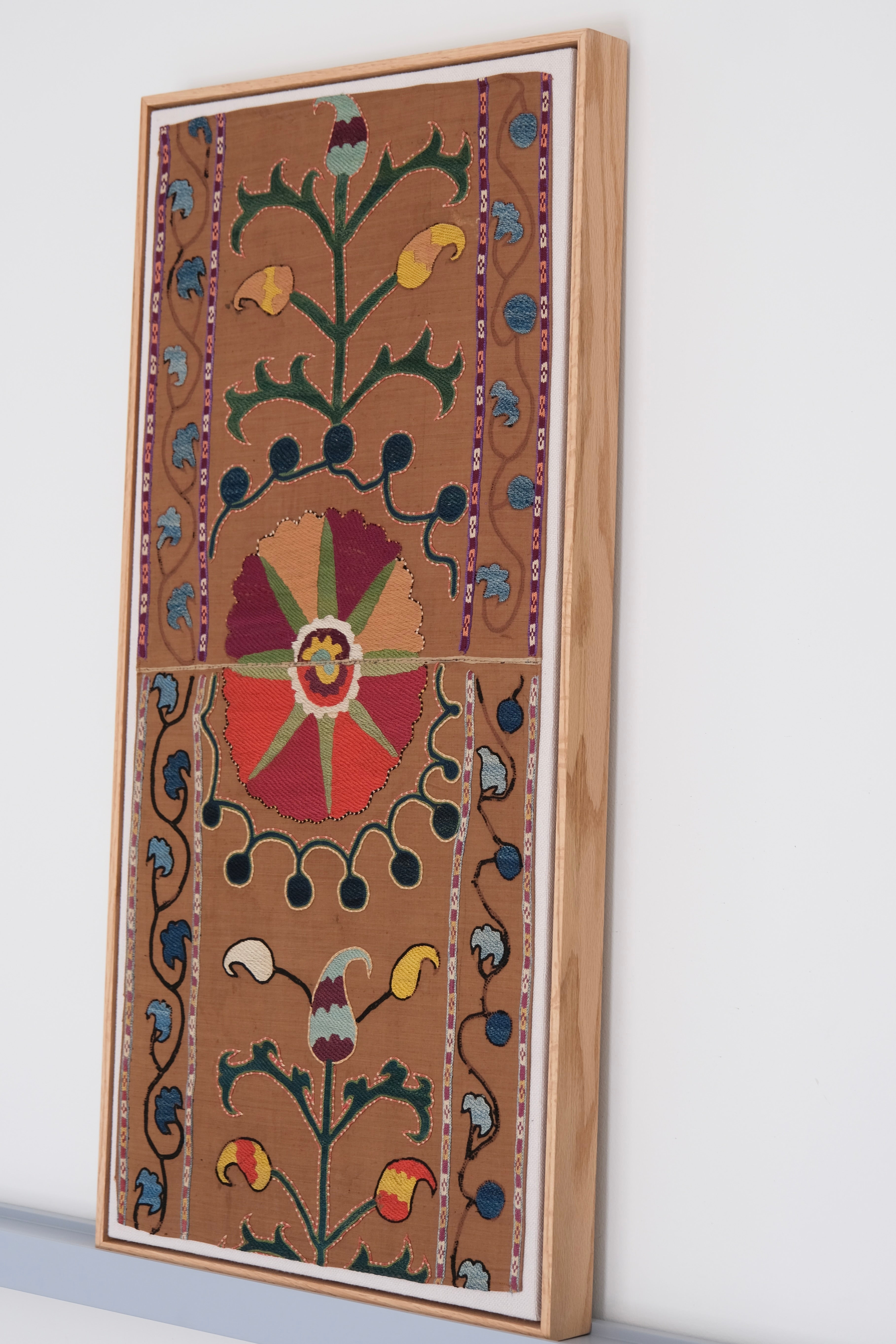 Framed antique suzani, camel & ivory