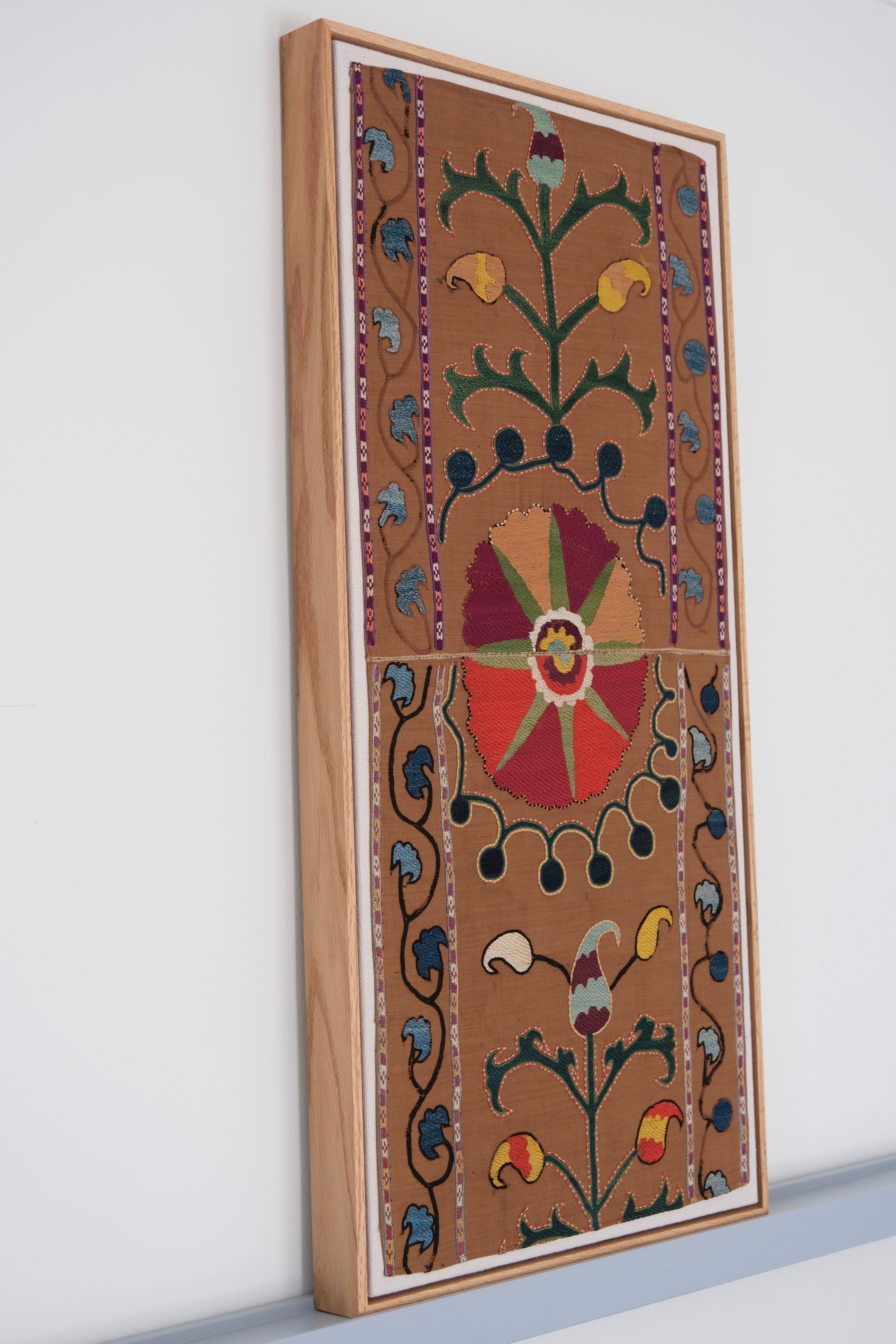 Framed antique suzani, camel & ivory