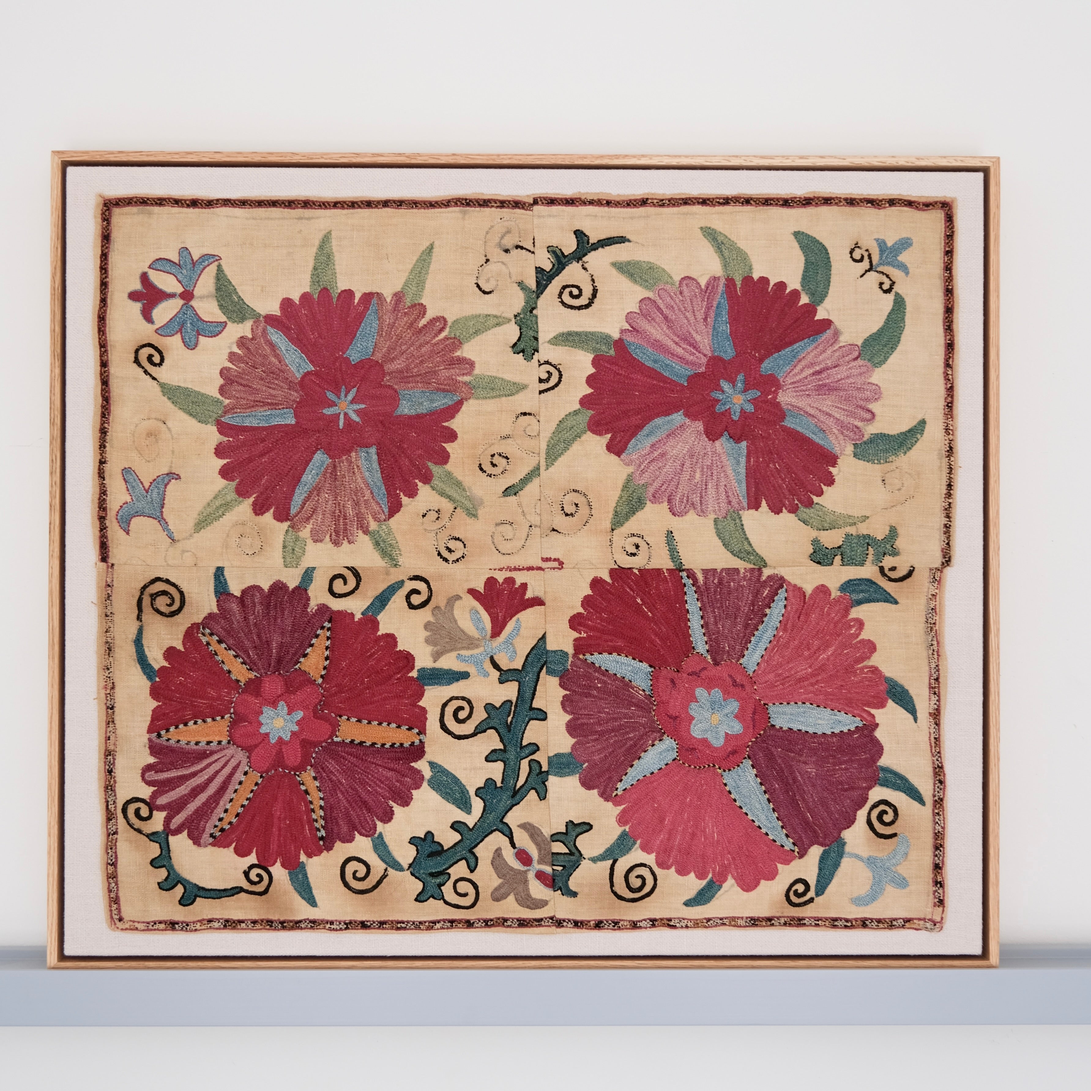 Framed antique suzani, pink & tan