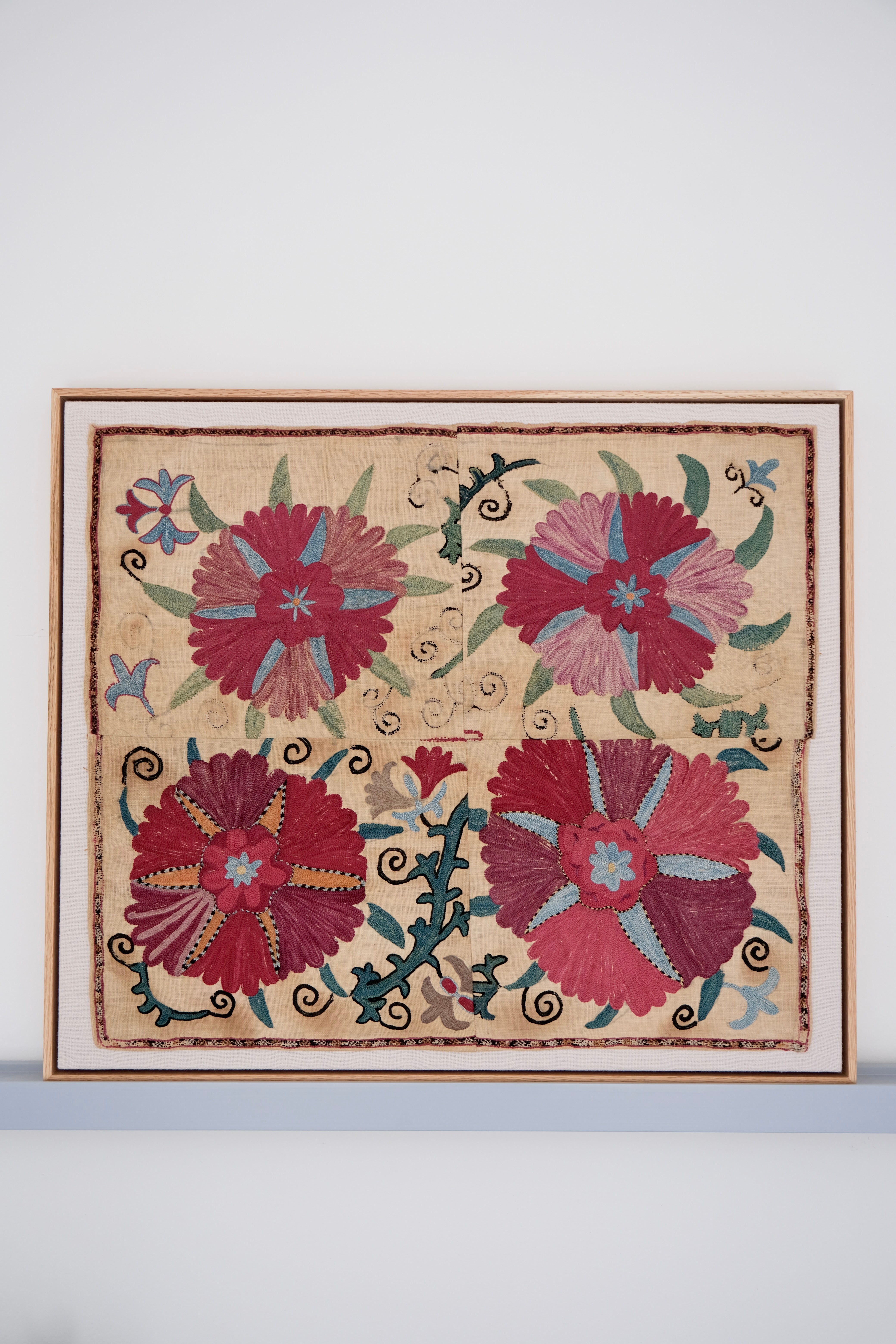 Framed antique suzani, pink & tan