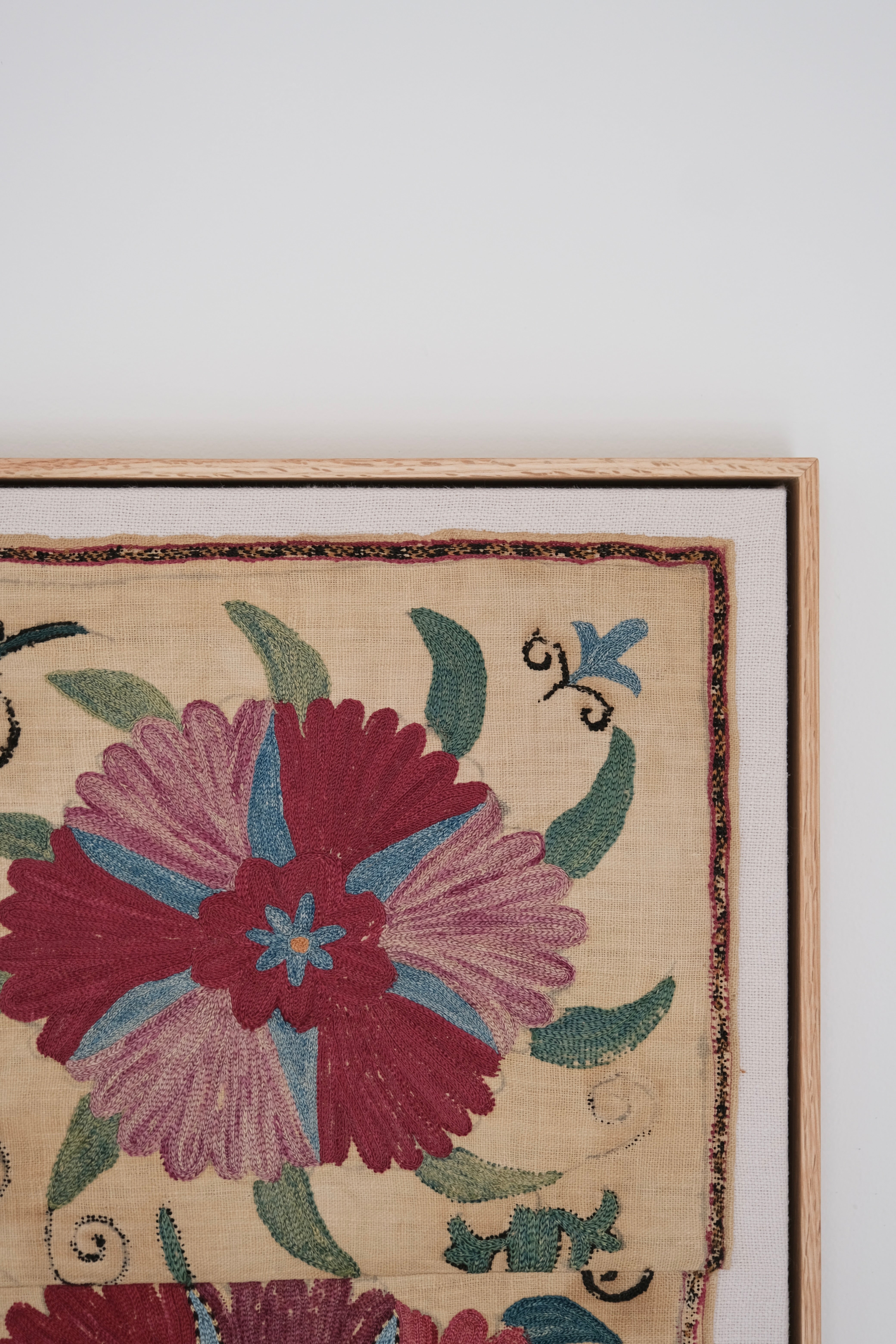 Framed antique suzani, pink & tan