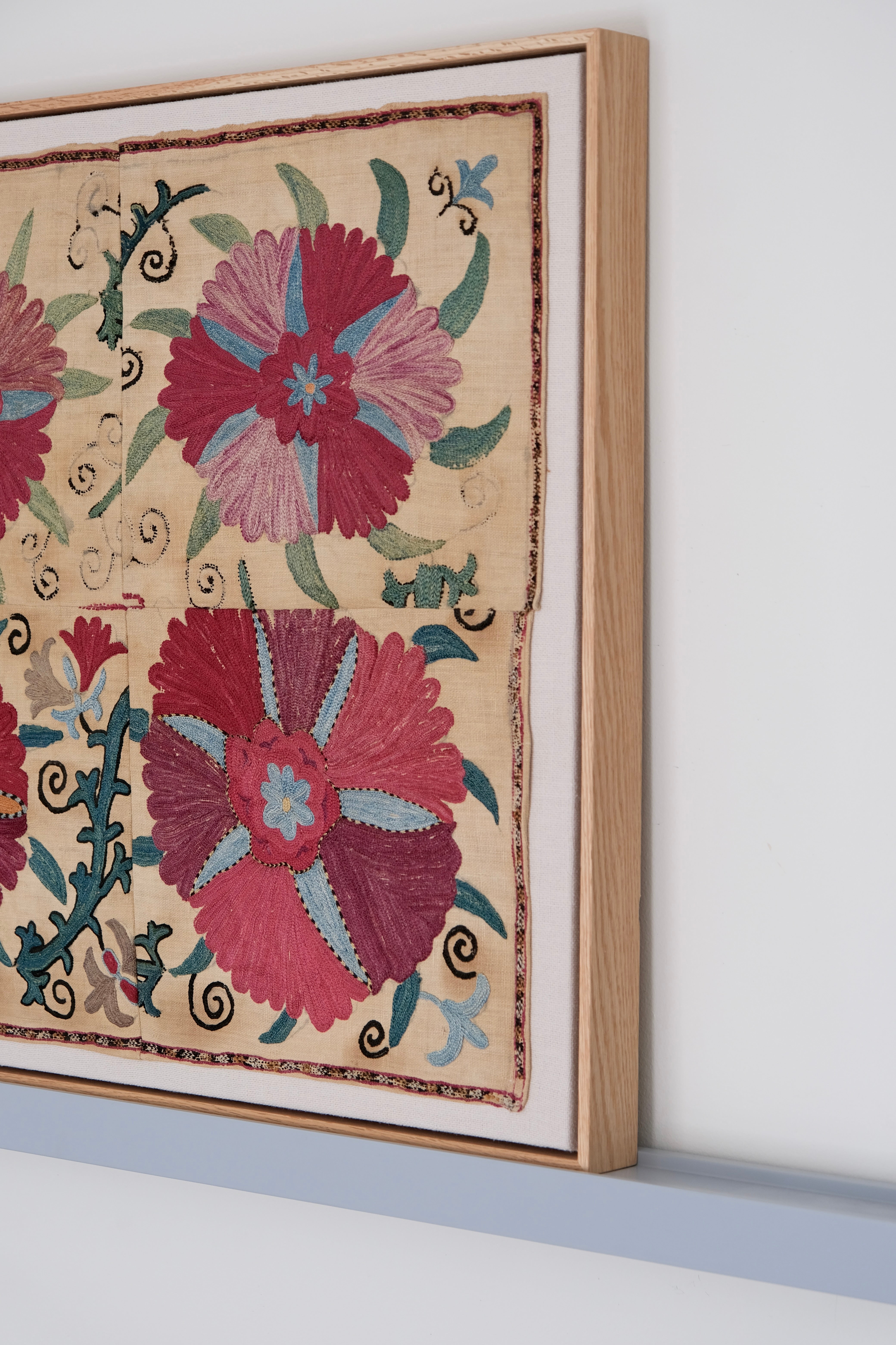 Framed antique suzani, pink & tan