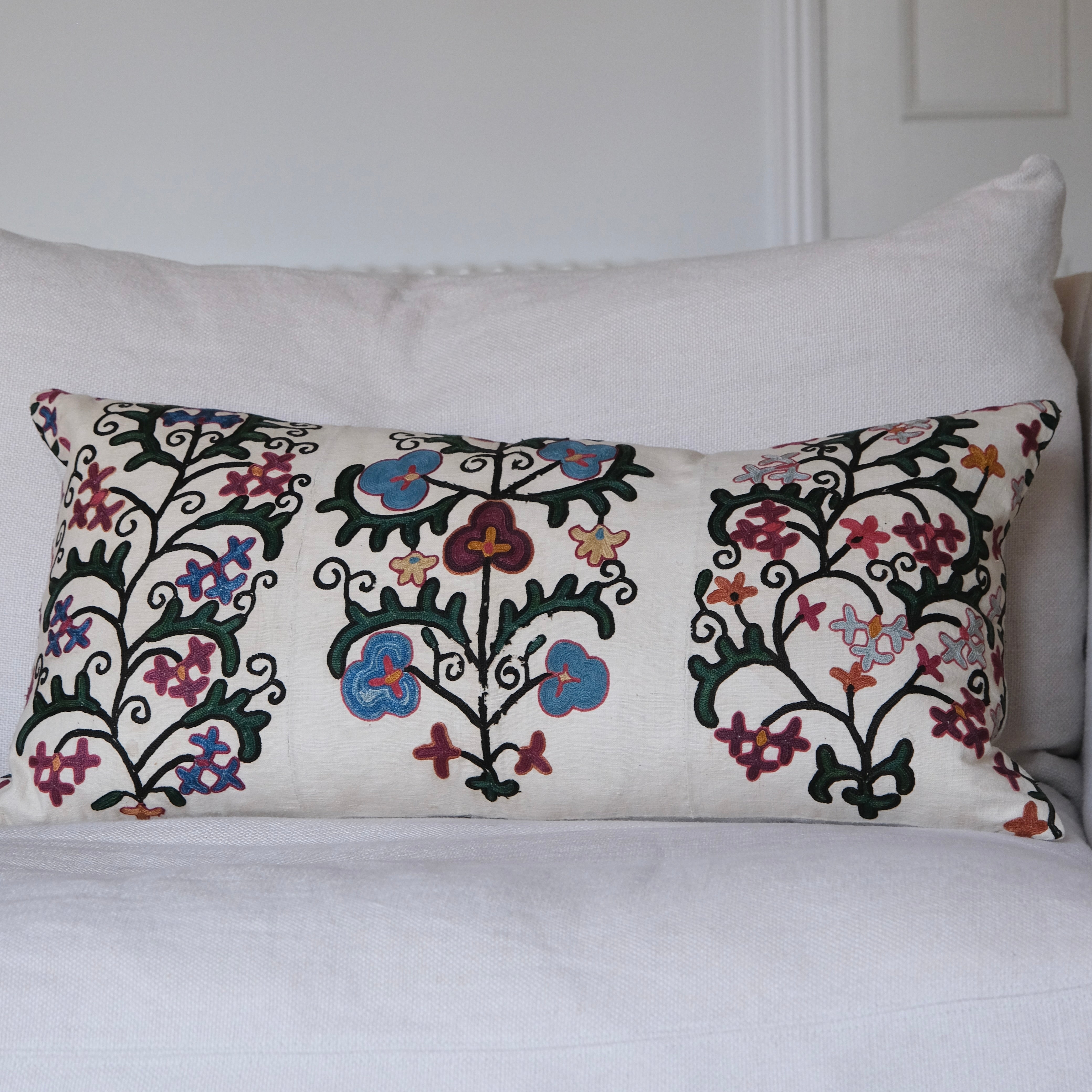 Antique suzani lumbar cushion, floral design