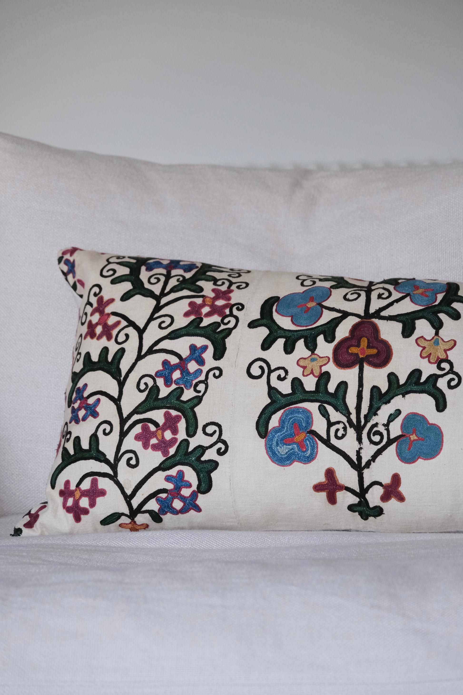 Antique suzani lumbar cushion, floral design