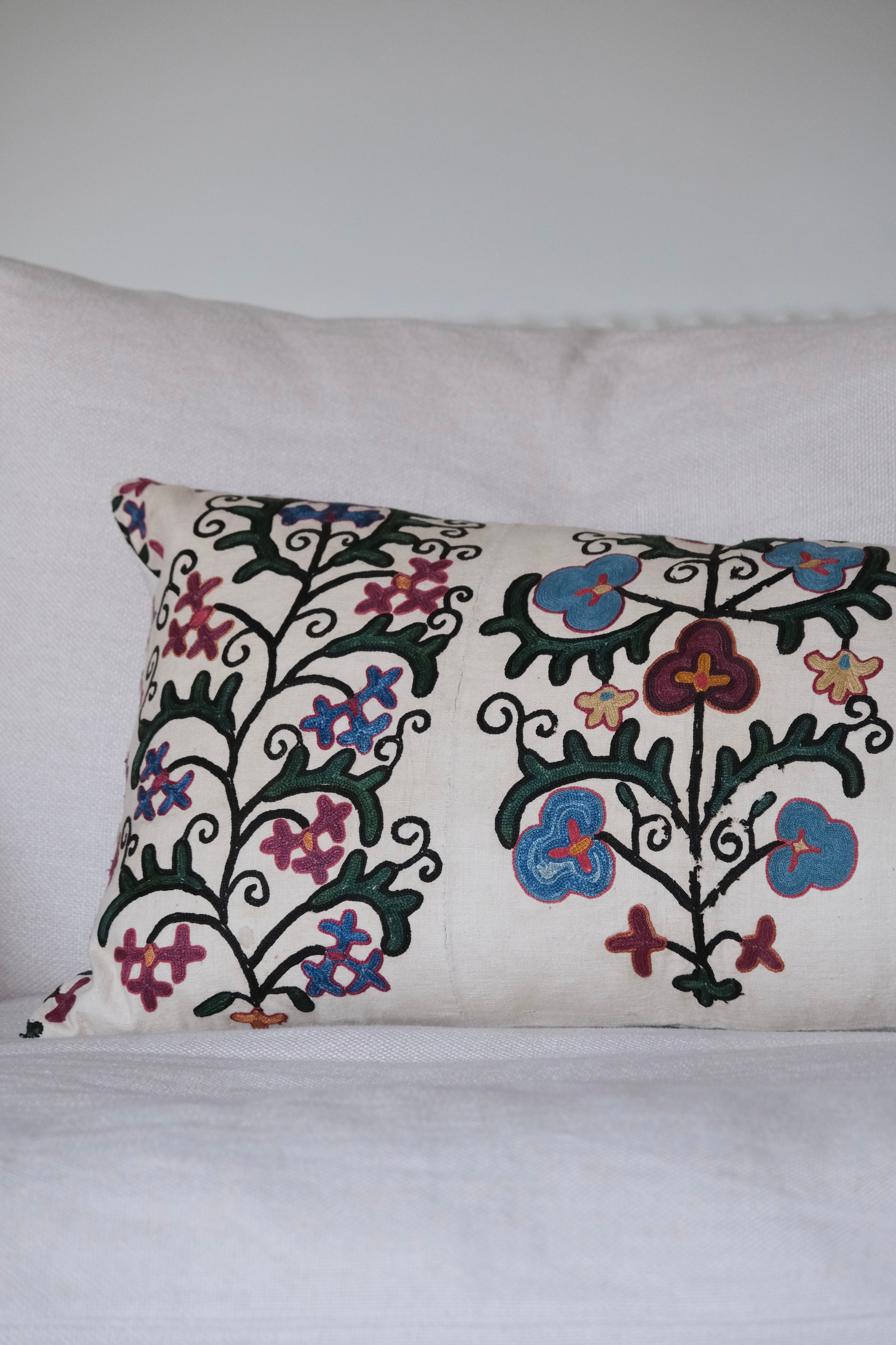 Antique suzani lumbar cushion, floral design