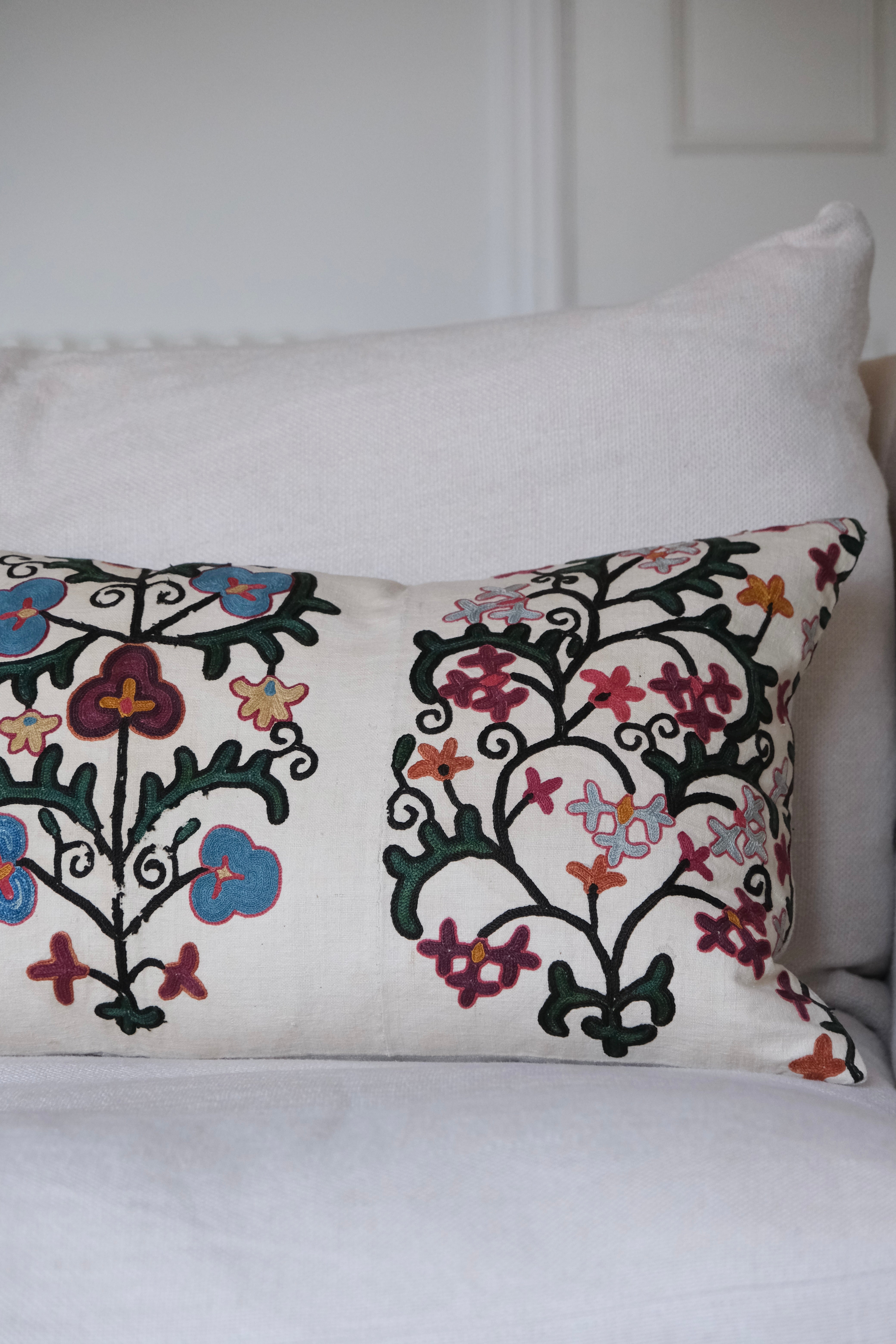 Antique suzani lumbar cushion, floral design