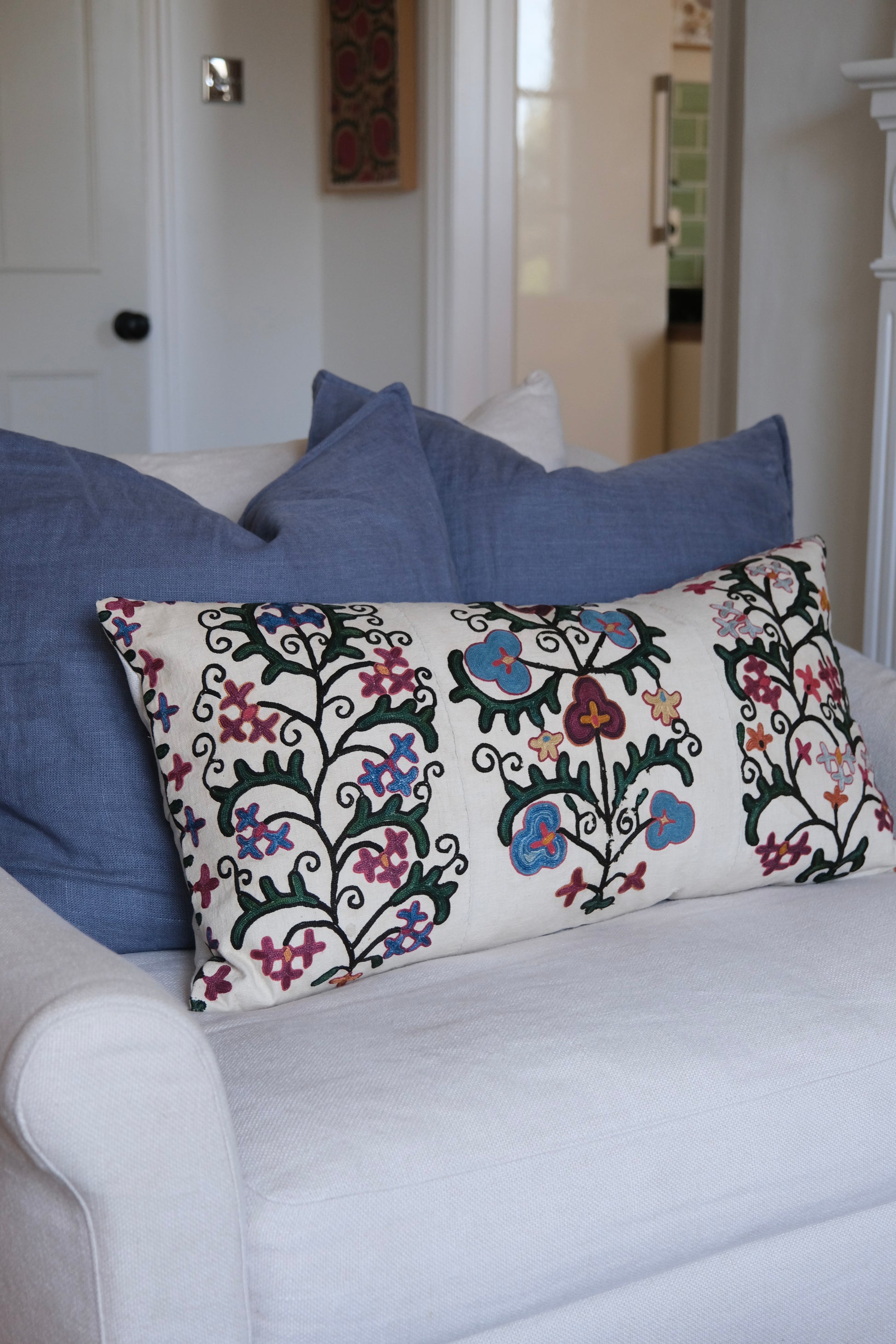 Antique suzani lumbar cushion, floral design