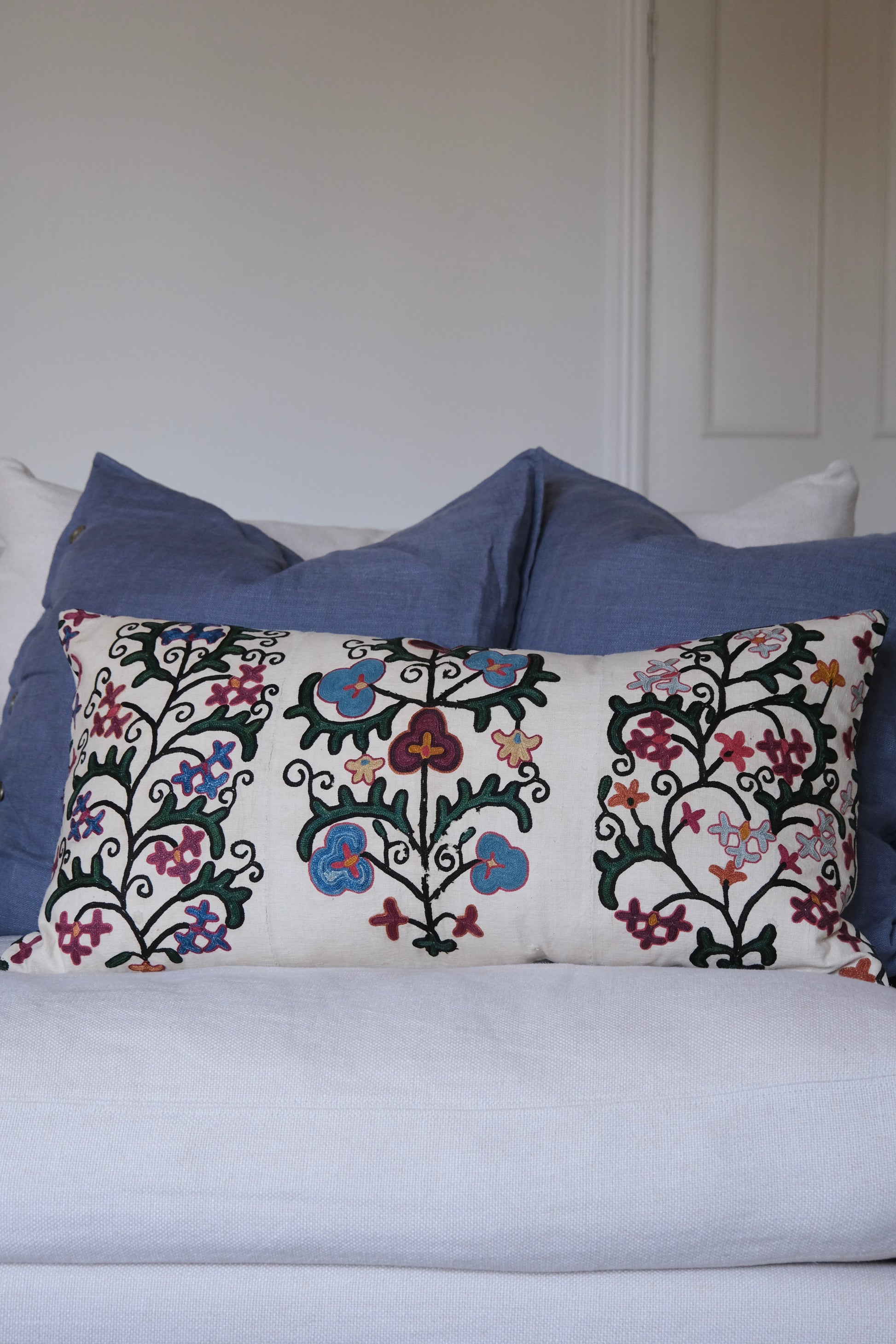 Antique suzani lumbar cushion, floral design