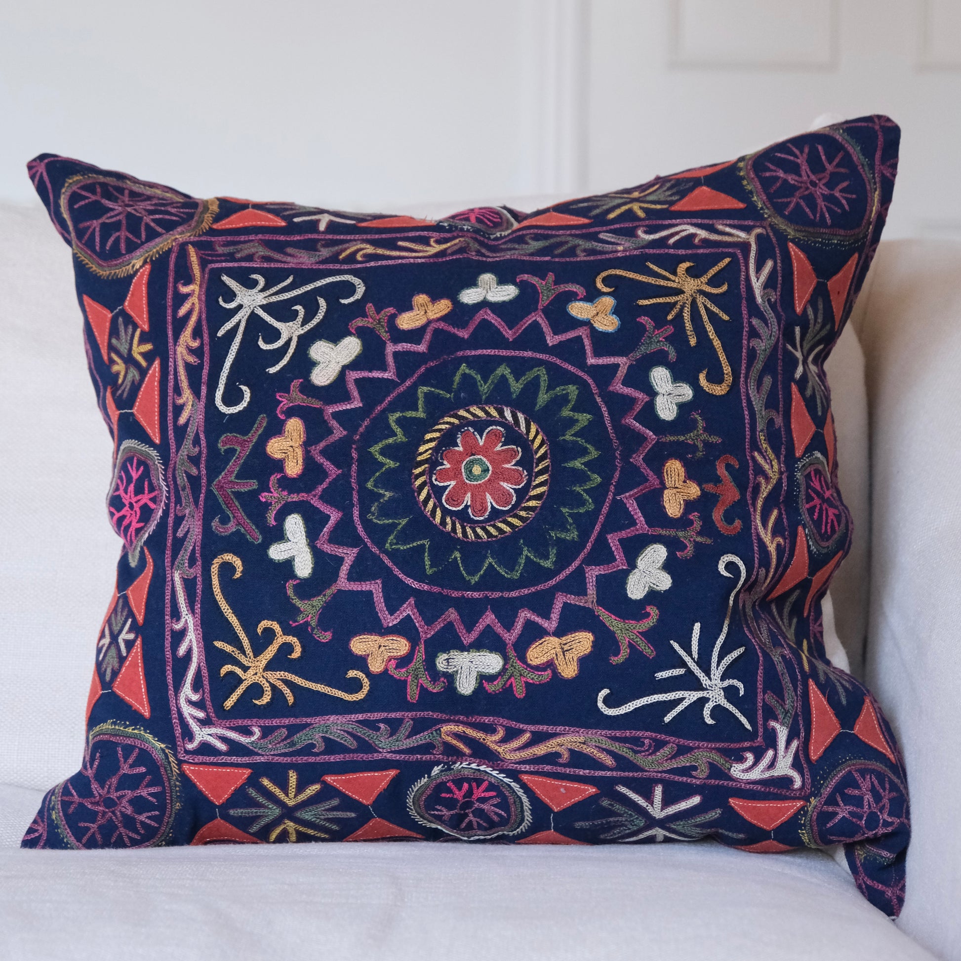 Vintage suzani cushion, blue with colourful pattern