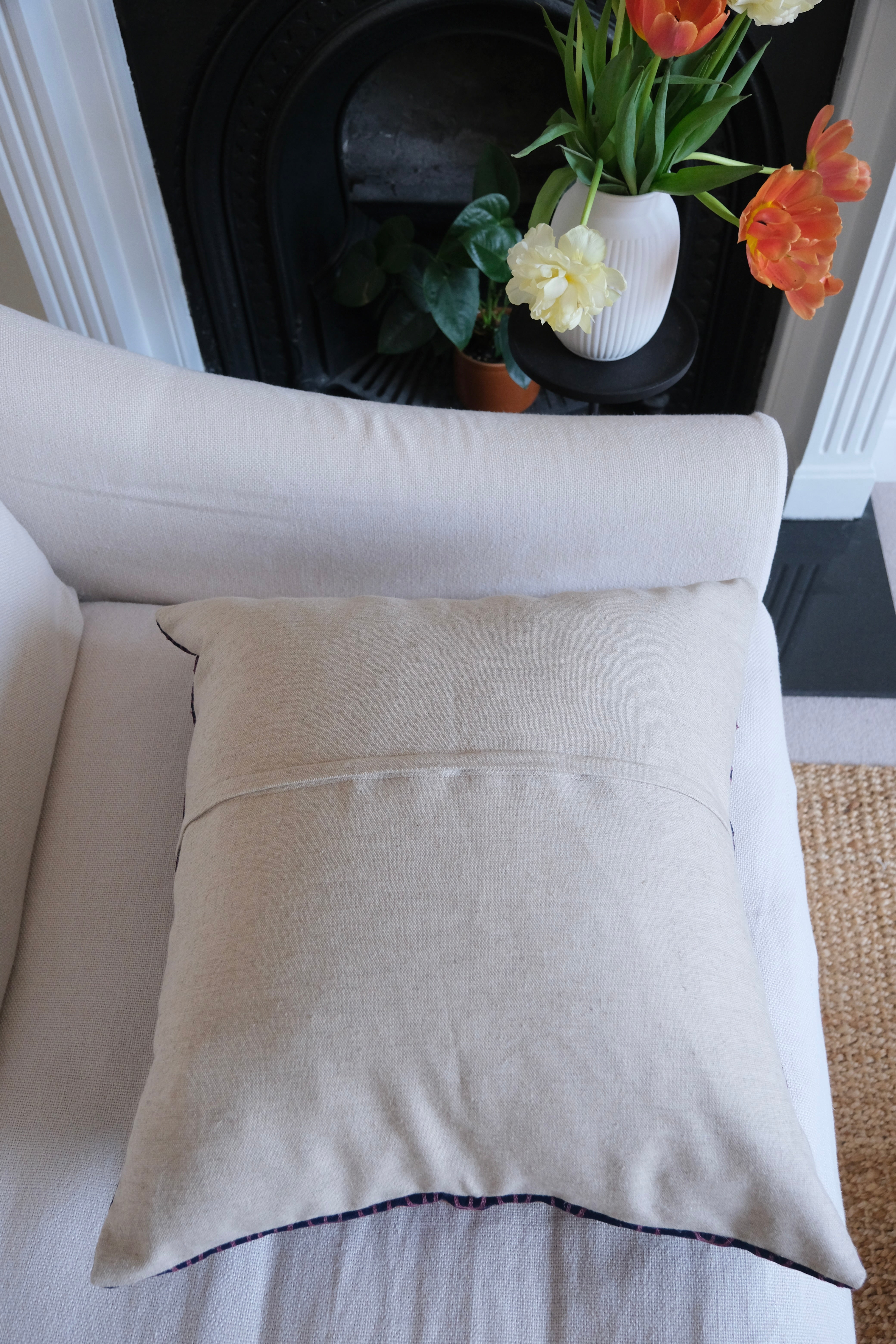 Vintage suzani cushion, blue with colourful pattern, linen back