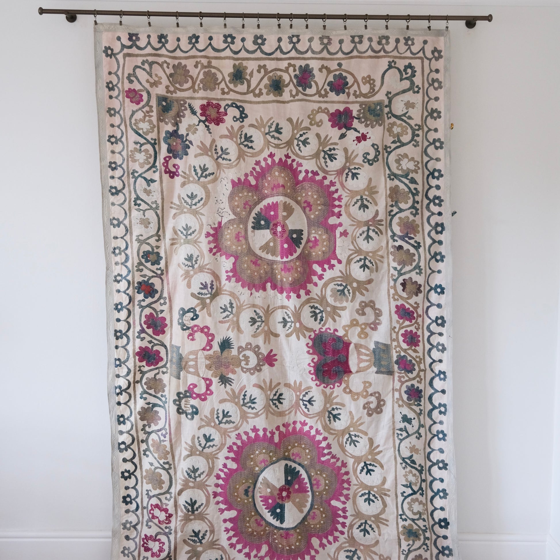 Vintage suzani, embroidered textile and decorative tapestry
