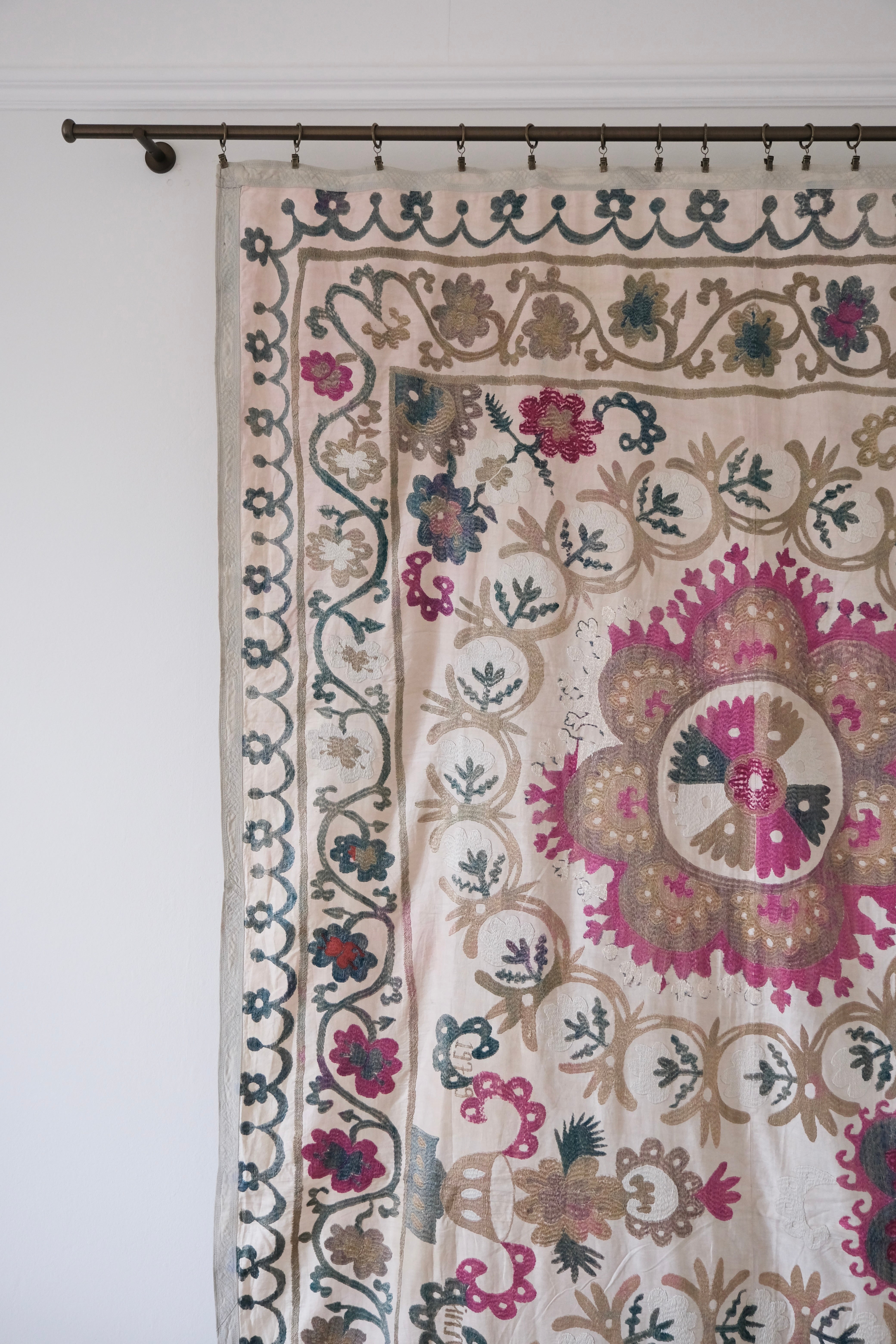 Vintage suzani, embroidered textile and decorative tapestry