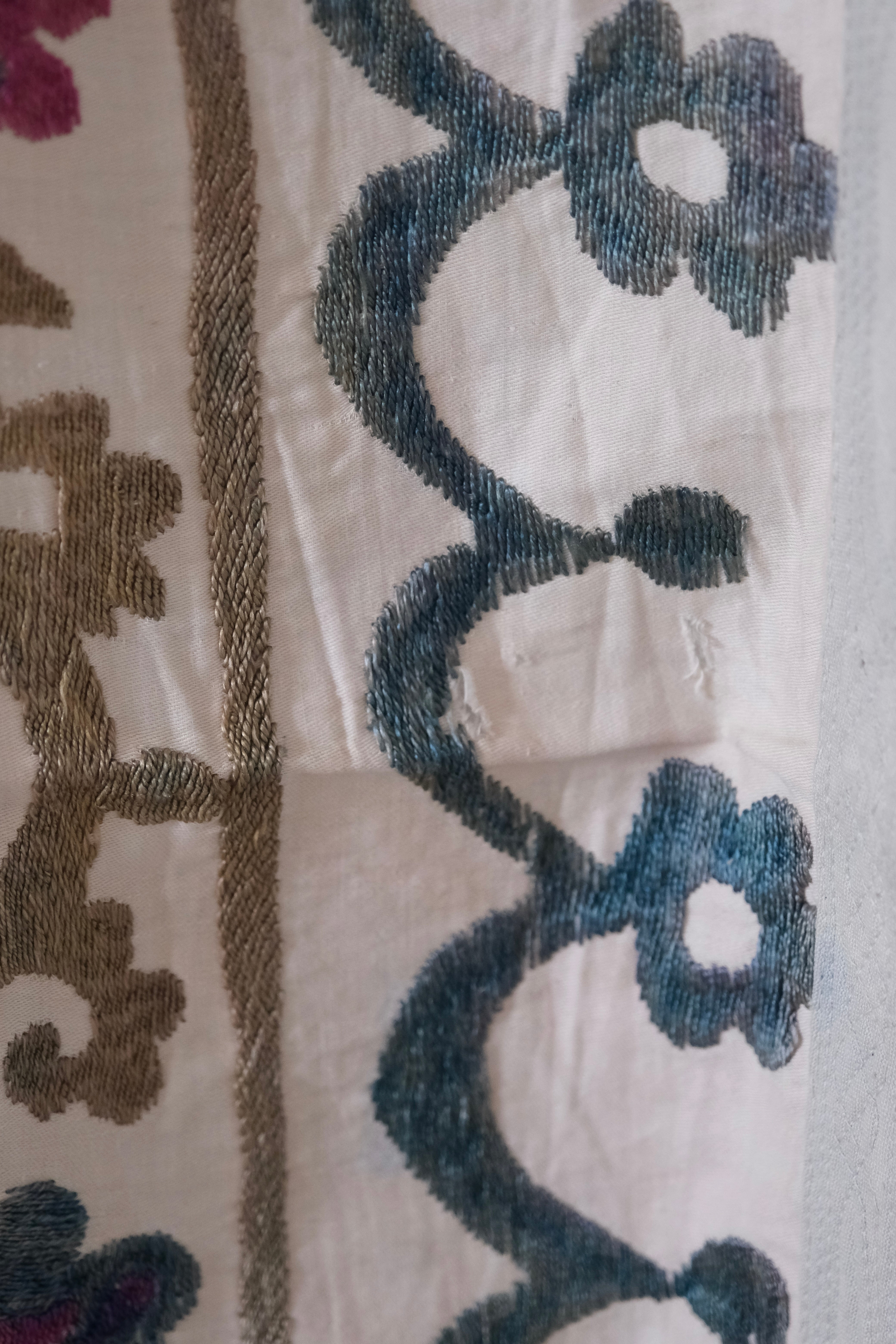 Vintage suzani, embroidered textile and decorative tapestry, close-up