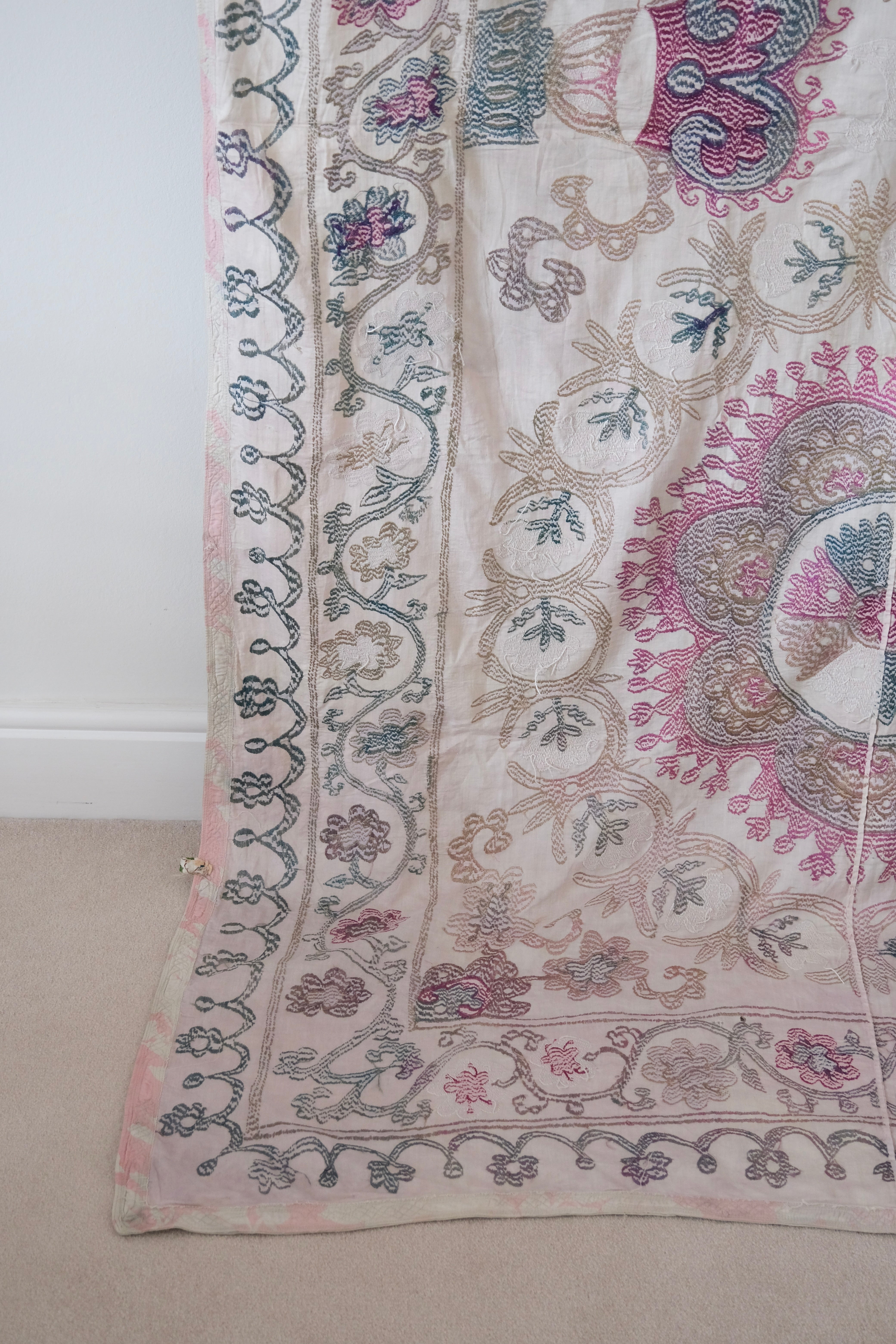 Vintage suzani, embroidered textile and decorative tapestry, backside
