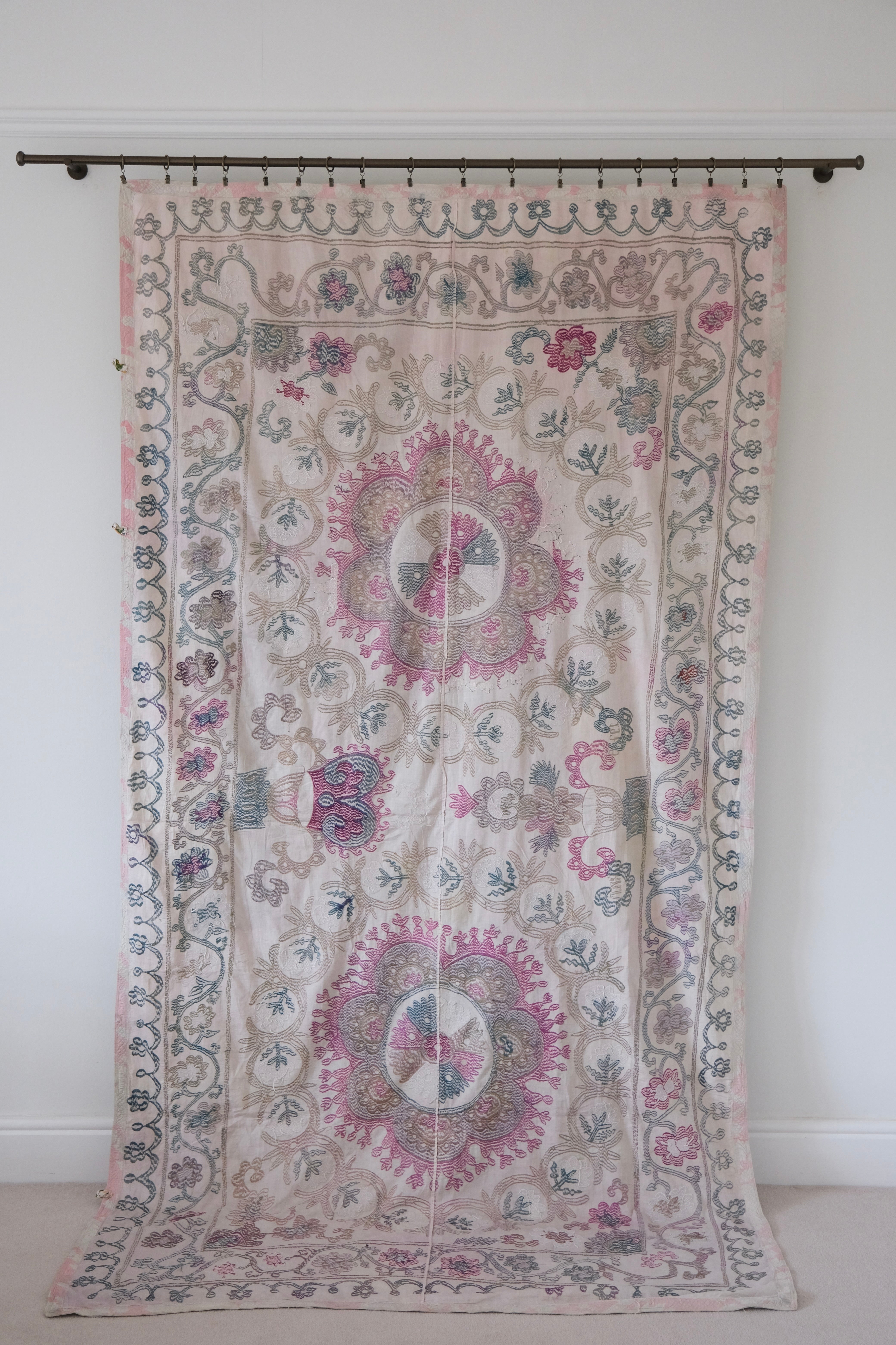 Vintage suzani, embroidered textile and decorative tapestry, backside