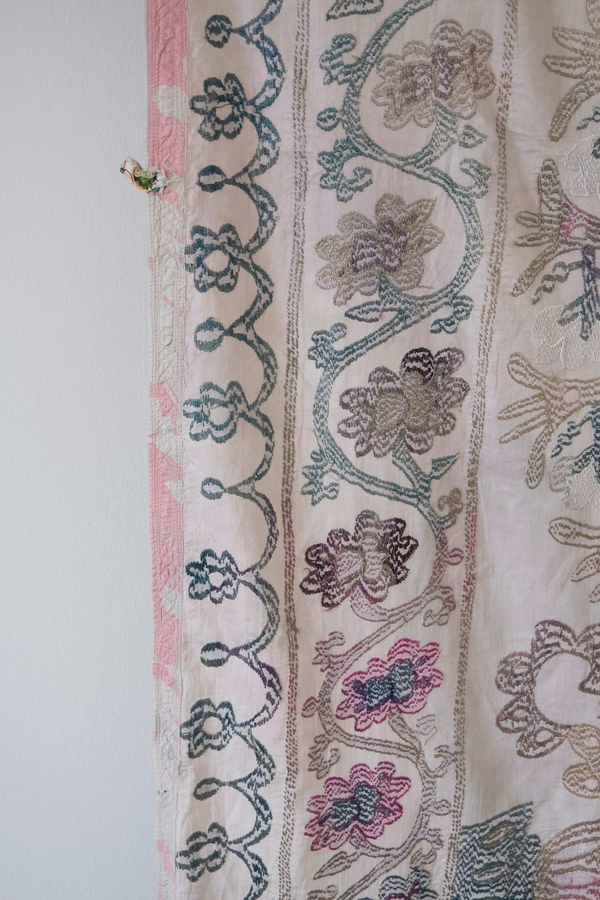 Vintage suzani, embroidered textile and decorative tapestry, backside