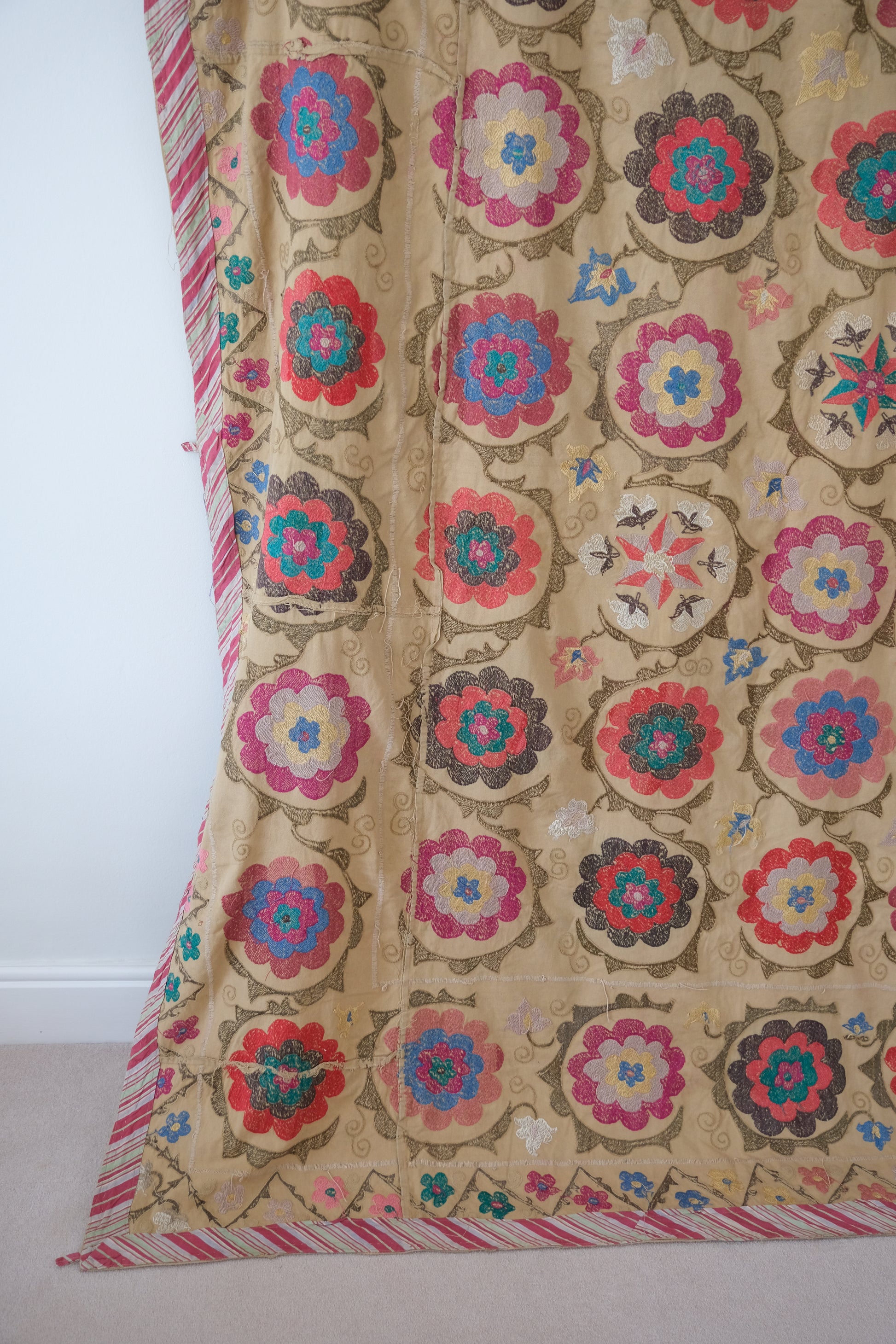 Vintage suzani, embroidered textile and decorative tapestry, large floral design, backside