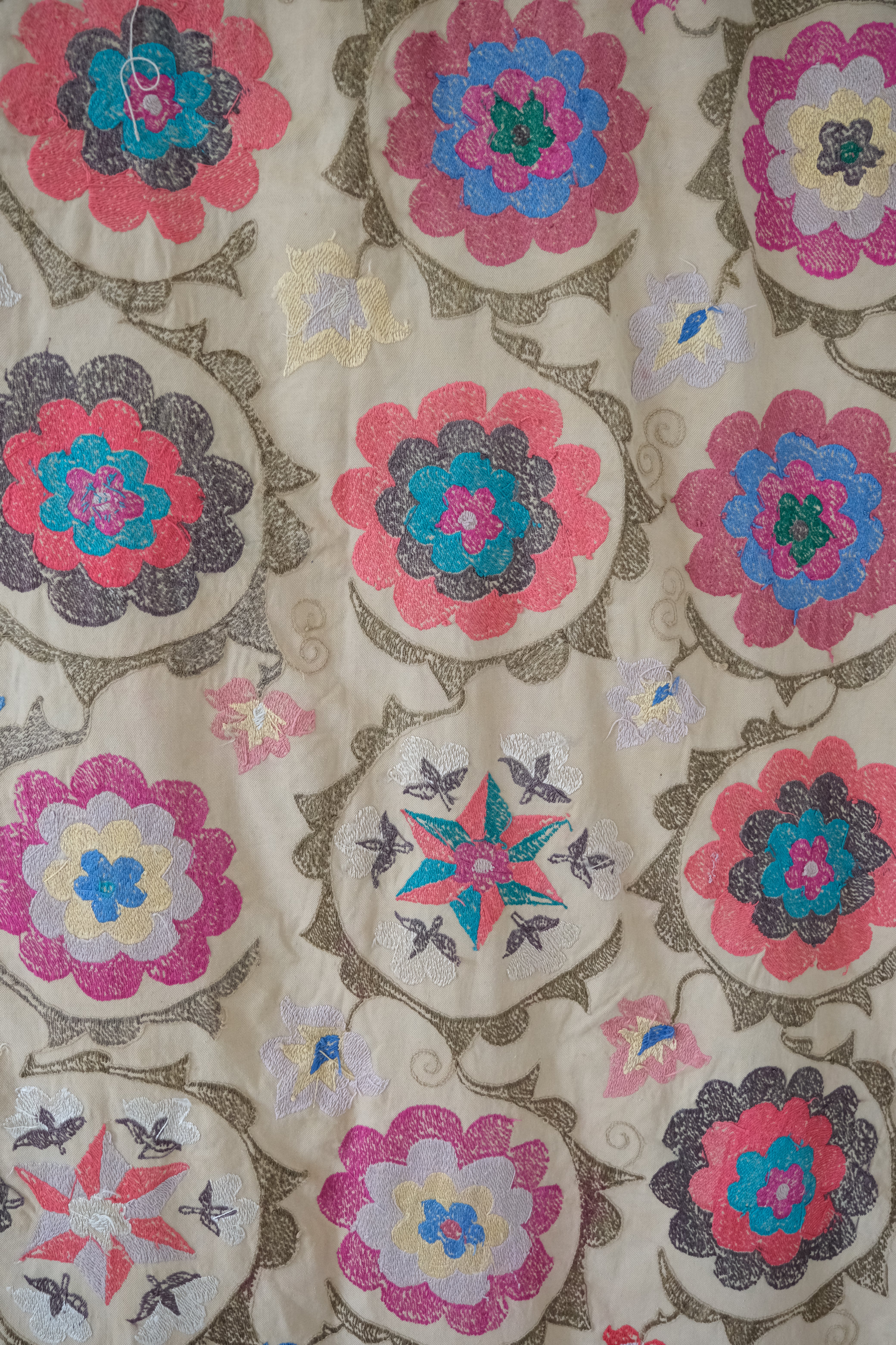 Vintage suzani, embroidered textile and decorative tapestry, large floral design, backside