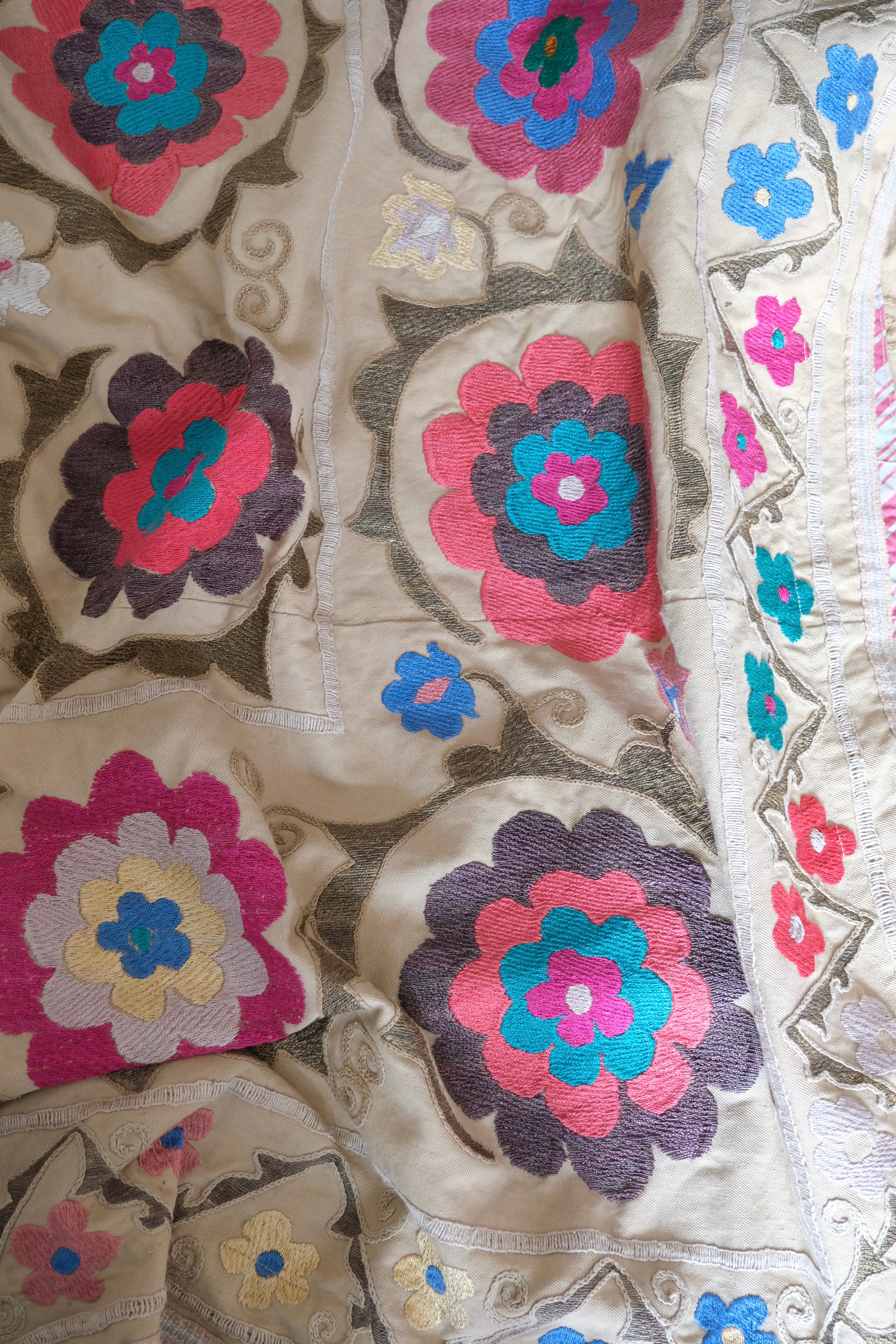 Vintage suzani, embroidered textile and decorative tapestry, large floral design, backside