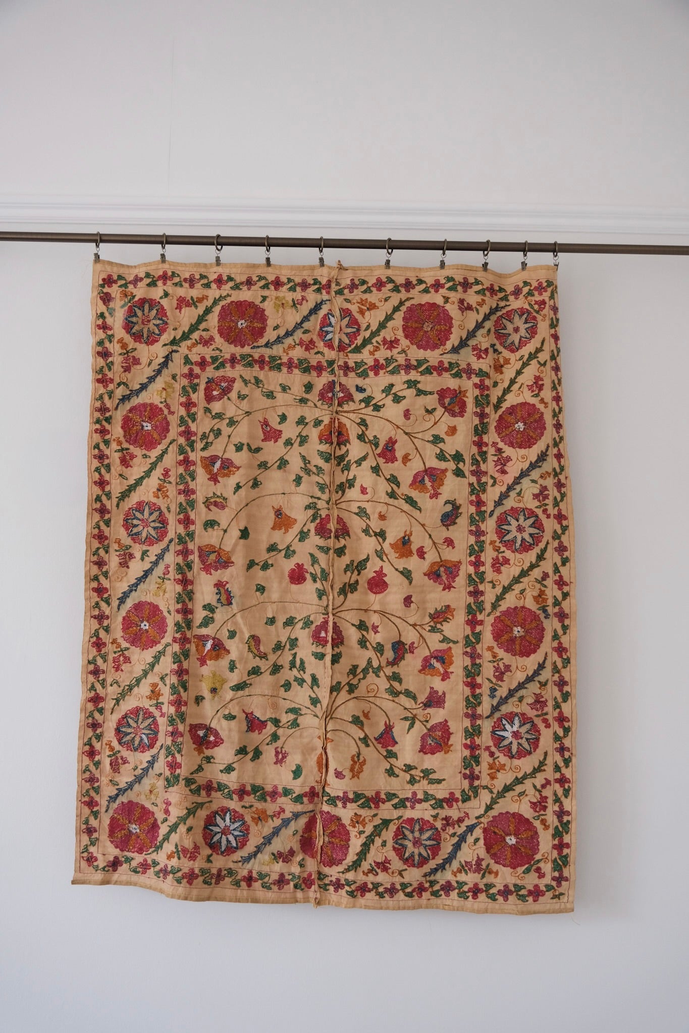 Antique suzani wallhanging, embroidered antique textile, camel with pink florals, backside