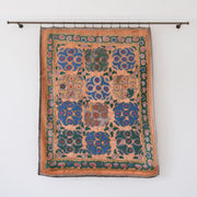 Vintage suzani, silk embroidered textile, orange and floral design