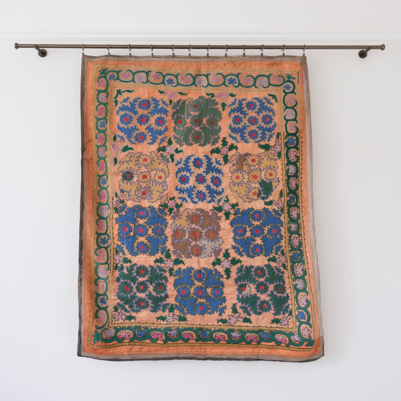 Vintage suzani, silk embroidered textile, orange and floral design