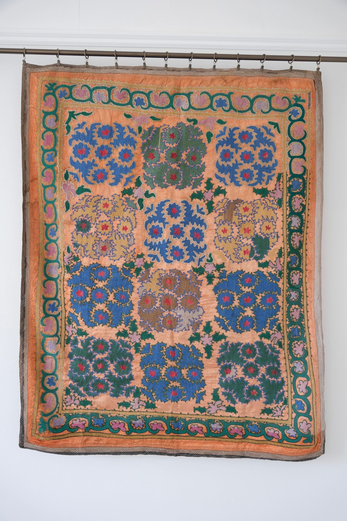 Vintage suzani, silk embroidered textile, orange and floral design