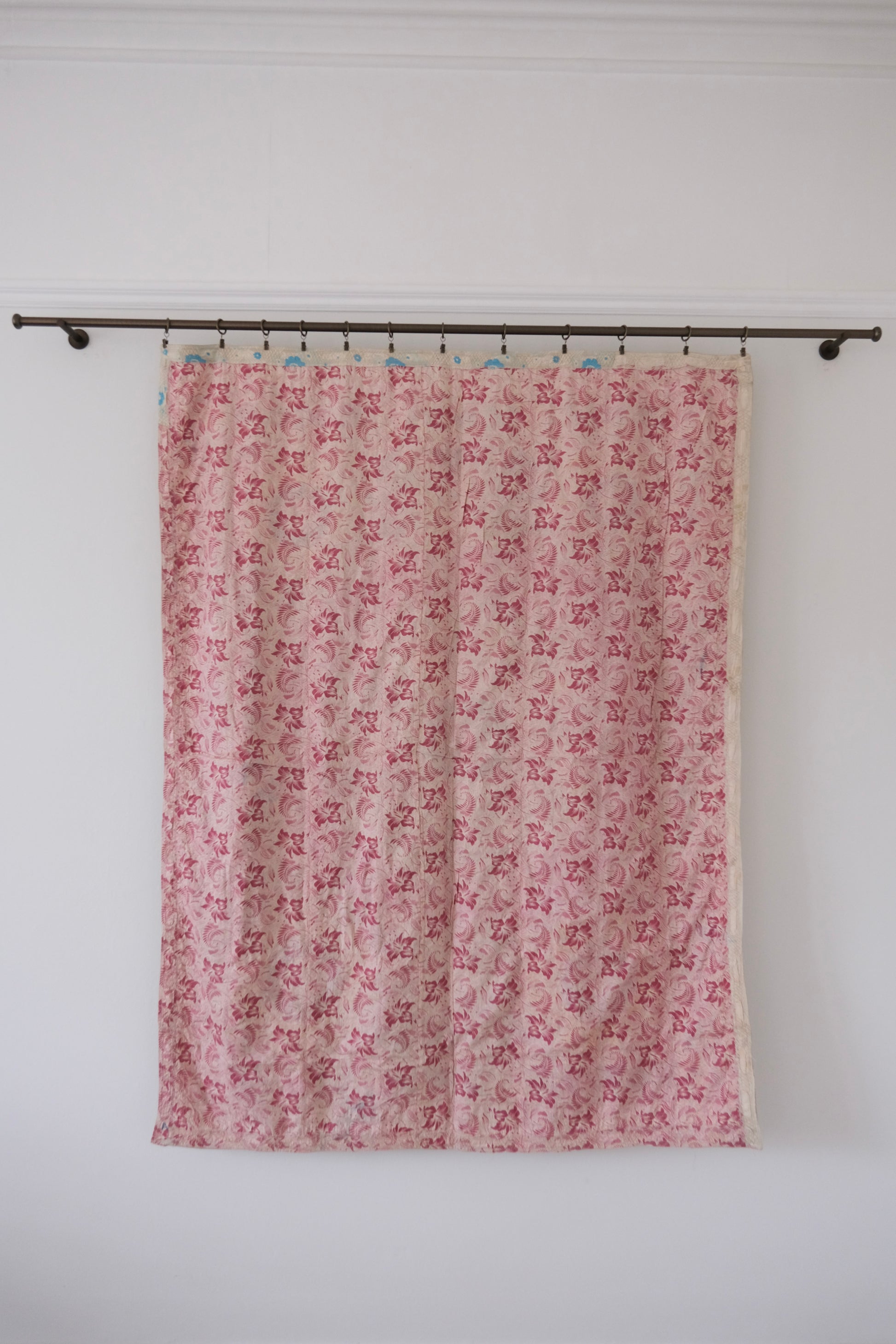 Vintage suzani, decorative embroidered tapestry, pink with geometric and floral design, backside