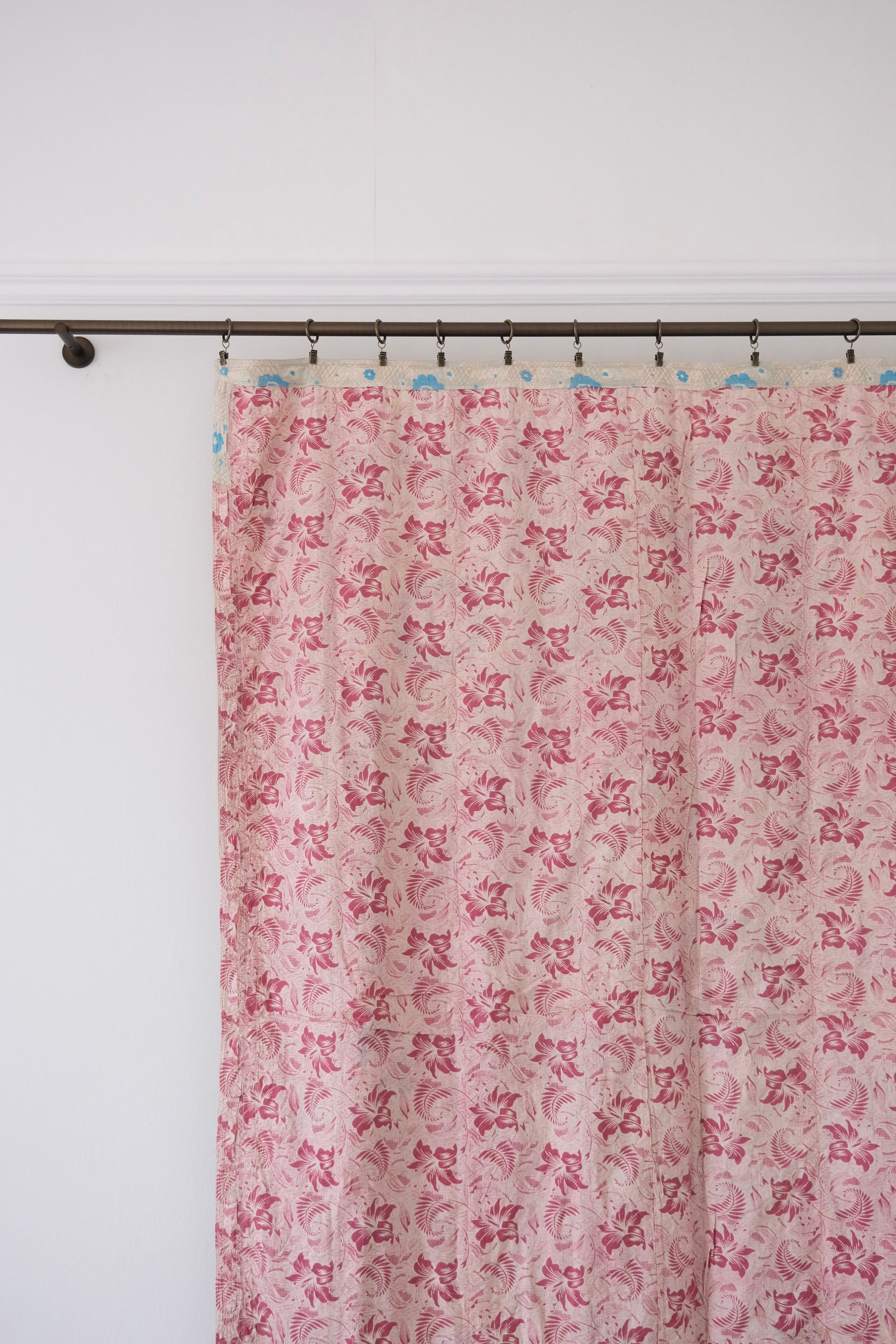 Vintage suzani, decorative embroidered tapestry, pink with geometric and floral design, backside