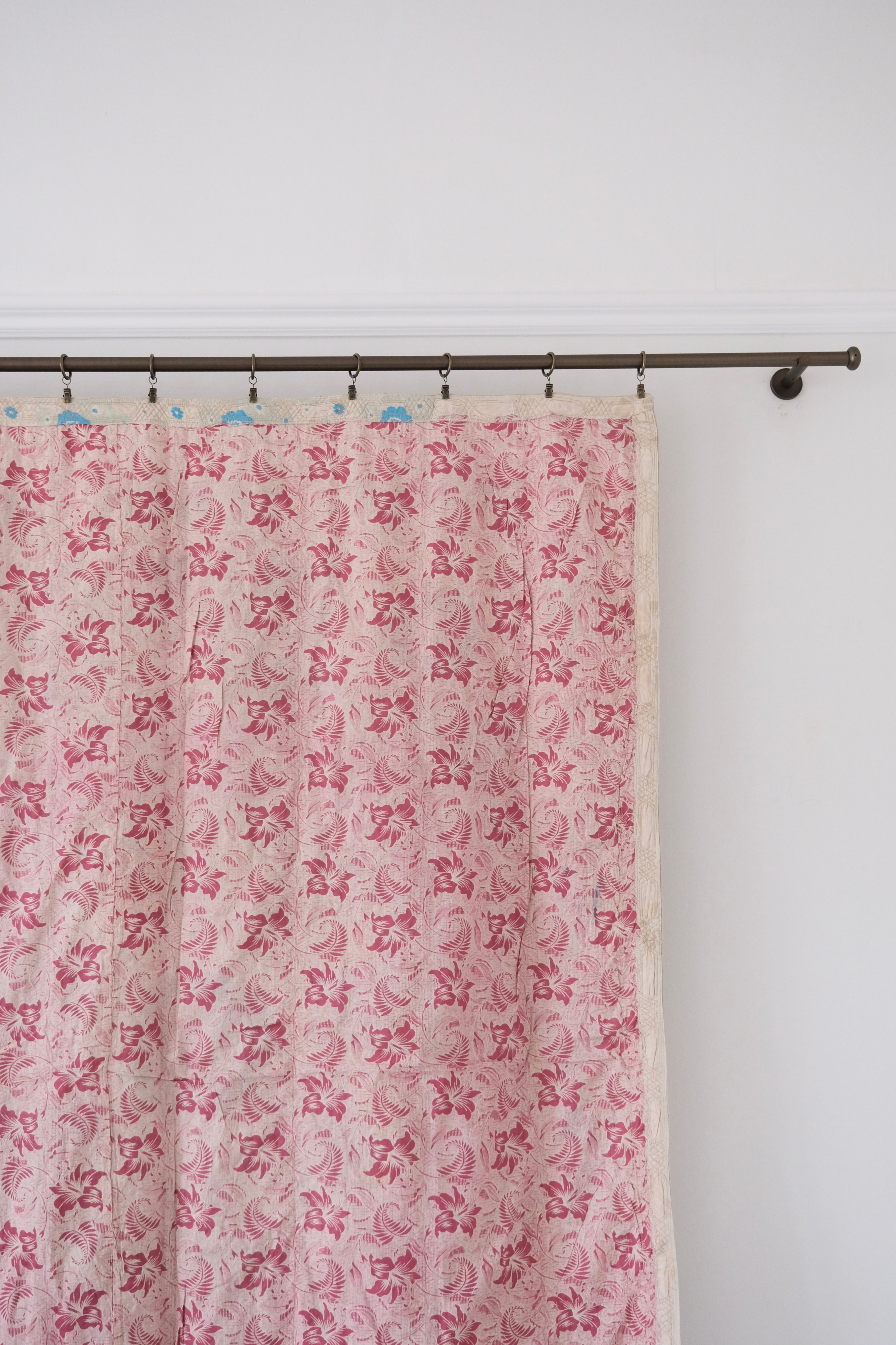 Vintage suzani, decorative embroidered tapestry, pink with geometric and floral design, backside