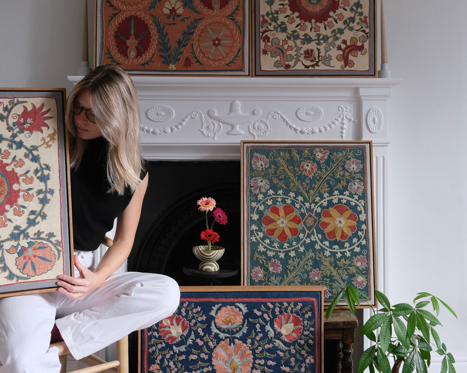 Collection of framed suzanis, framed textiles, embroidered textile art