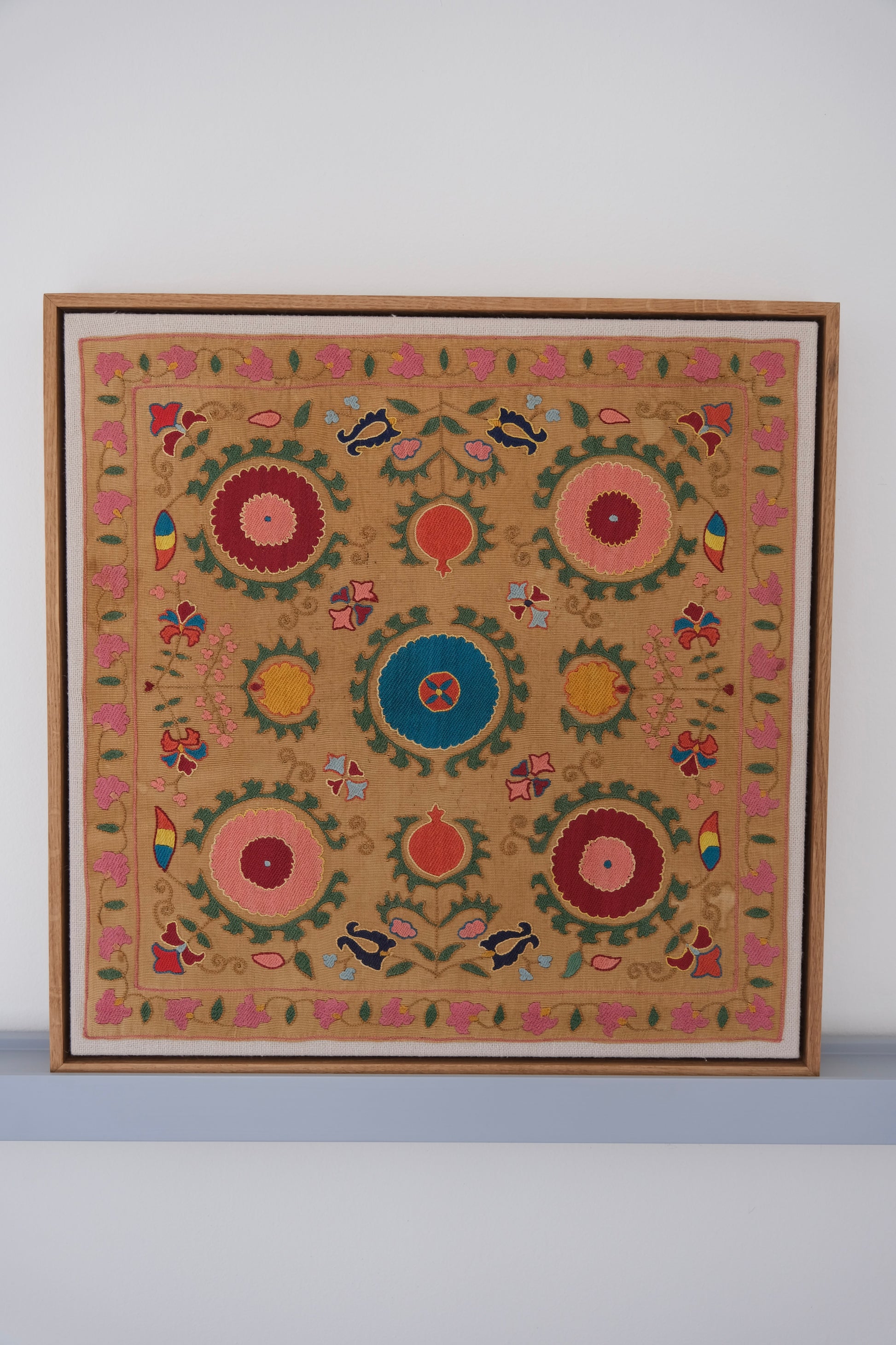 Framed antique suzani, framed textile, embroidered textile art, wooden frame