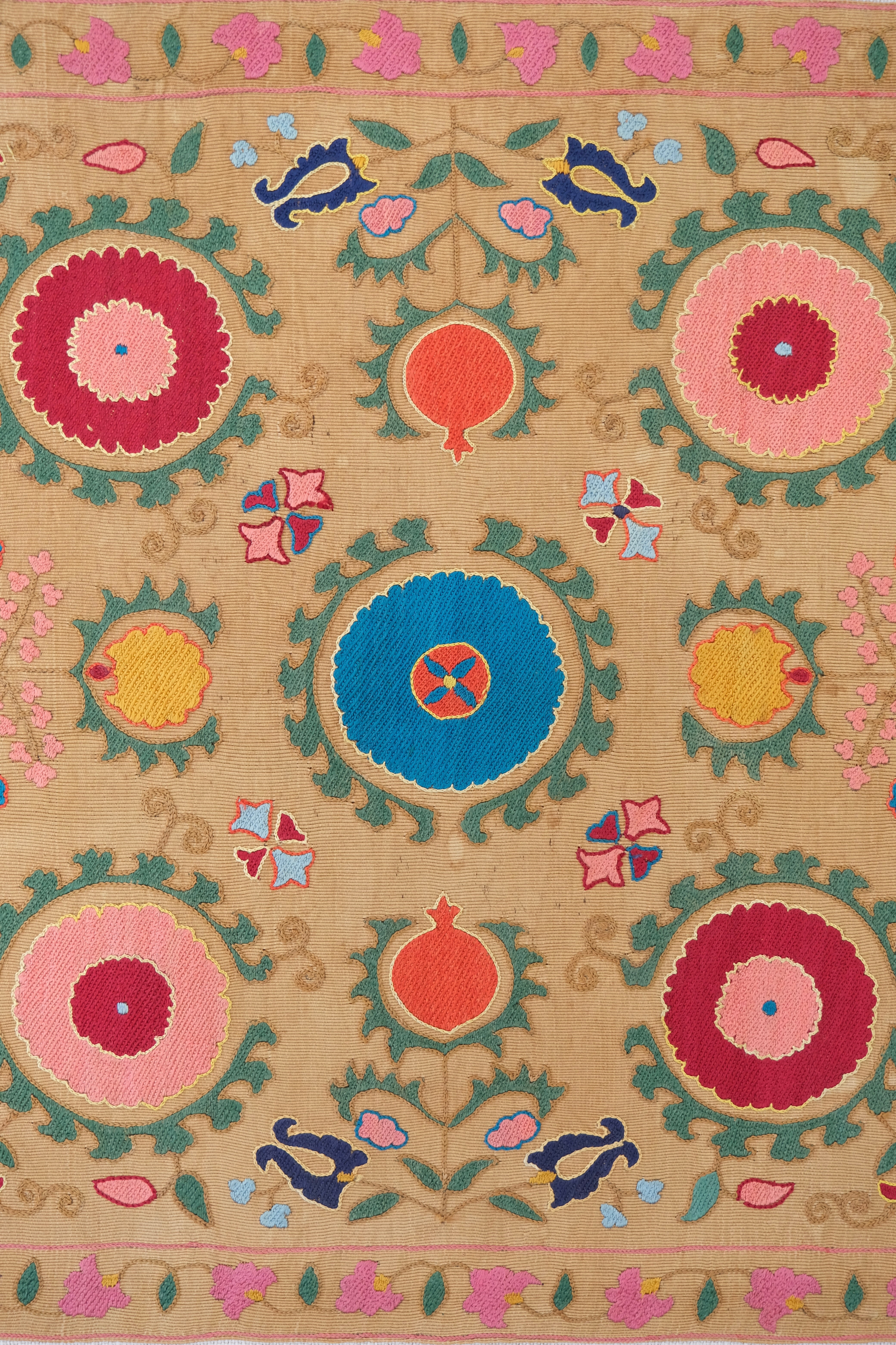 Framed antique suzani, framed textile, embroidered textile art, wooden frame, close-up